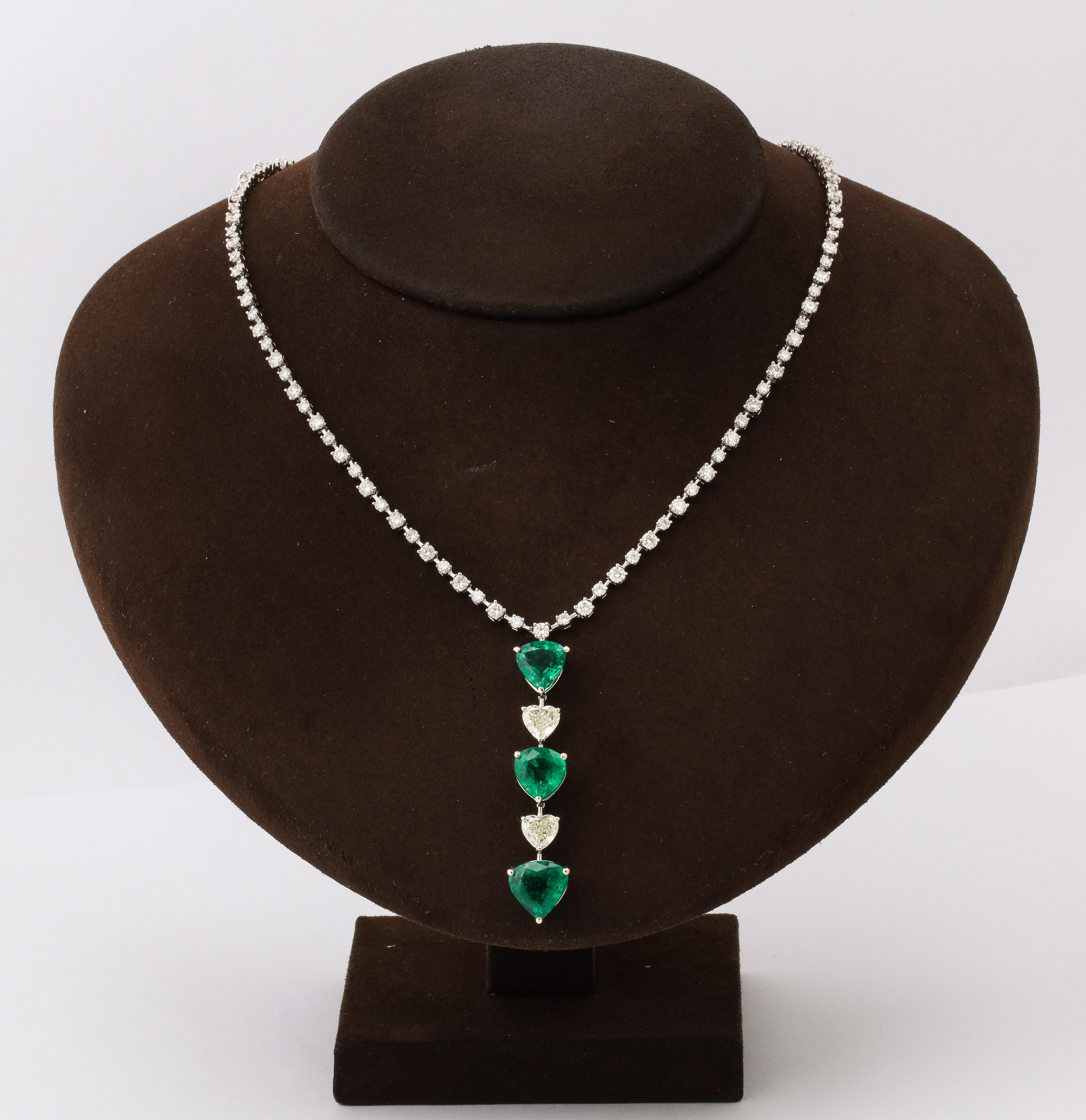 
A unique piece!

Three important VIVID GREEN heart shape Emeralds weighing 9.80 carats.

10.04 carats of round and heart shape white diamonds. 

Set in 18k white gold. 

The center drop featuring the heart shapes is 2.20 inches long. The necklace