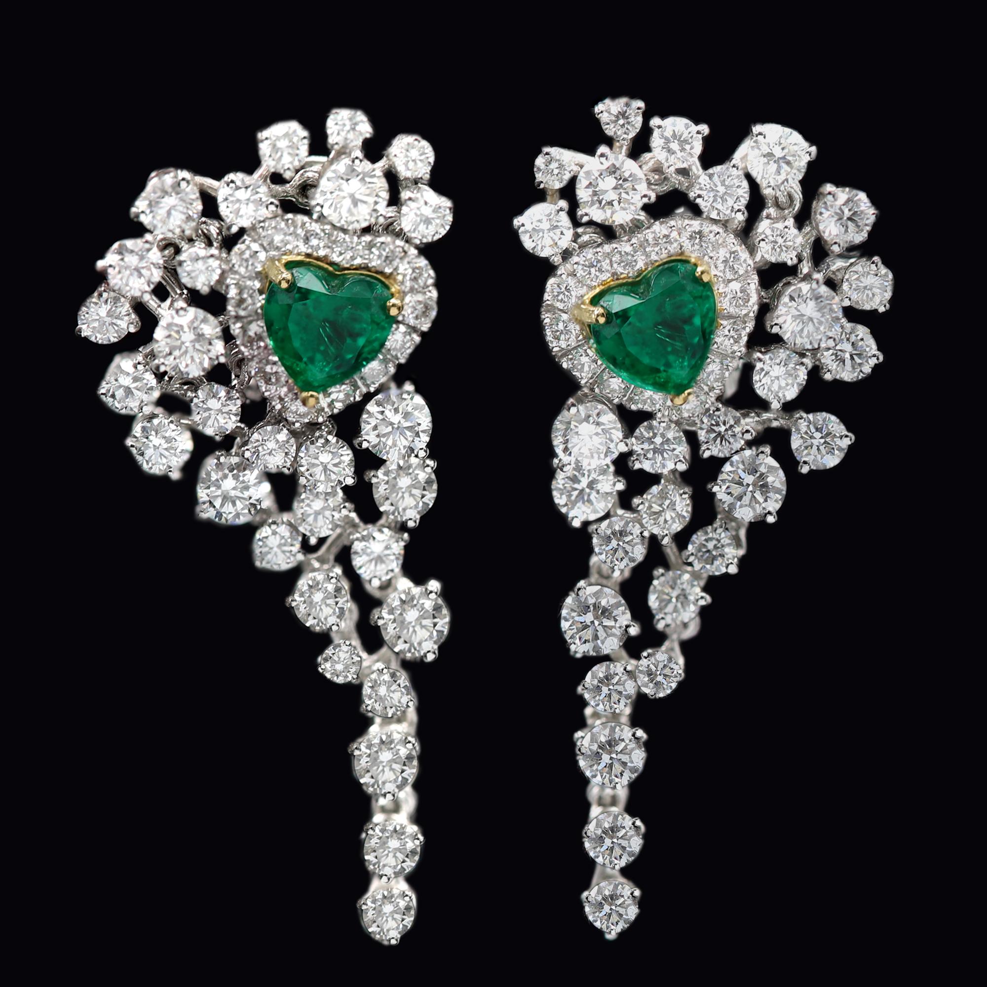 Very impresive Sparkling dangling earrings
Heart shape Natural Emeralds Total 1.66 carat - nice good color.
Total Natural Diamonds 4.85 carat G-VS-SI.
18k White Gold 12.0 grams
Omega type back closure.
Overall approx size 1.5' Inch long (40