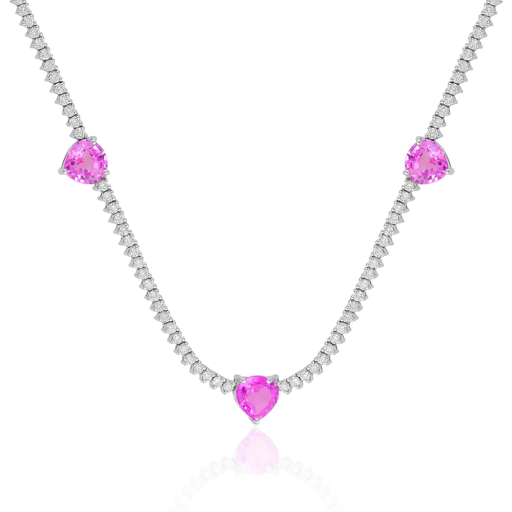 Presenting this exquisite heart-shaped pink gemstone necklace, adorned with diamond accents, crafted in 18 karat white gold. This stunning handmade jewelry piece exudes elegance and charm, making it a perfect accessory for any special occasion or as