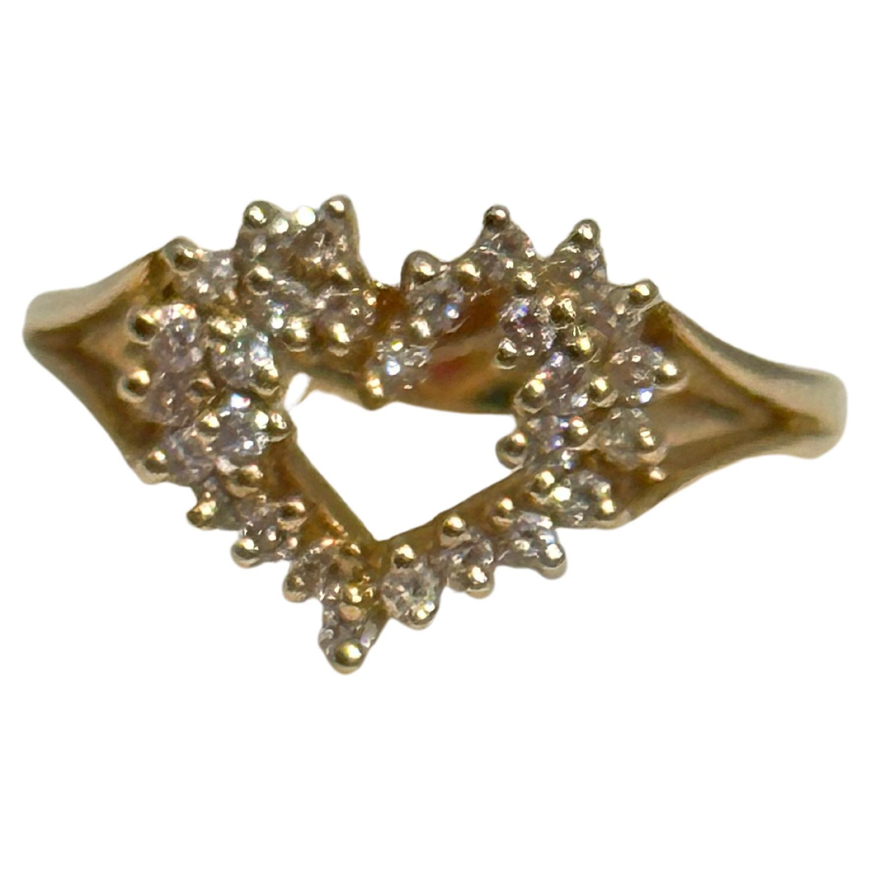 Heart Shape Gold & Diamond Cocktail 14 Karat Gold Ring Size 6
14 K gold Stamped 3.11 Grams. 
Diamond Eye clean 
There are brilliant cut Round diamonds in the ring 
Diamonds 0.5 ct approximately
Ring size is 6 but can be altered to any size.
Very