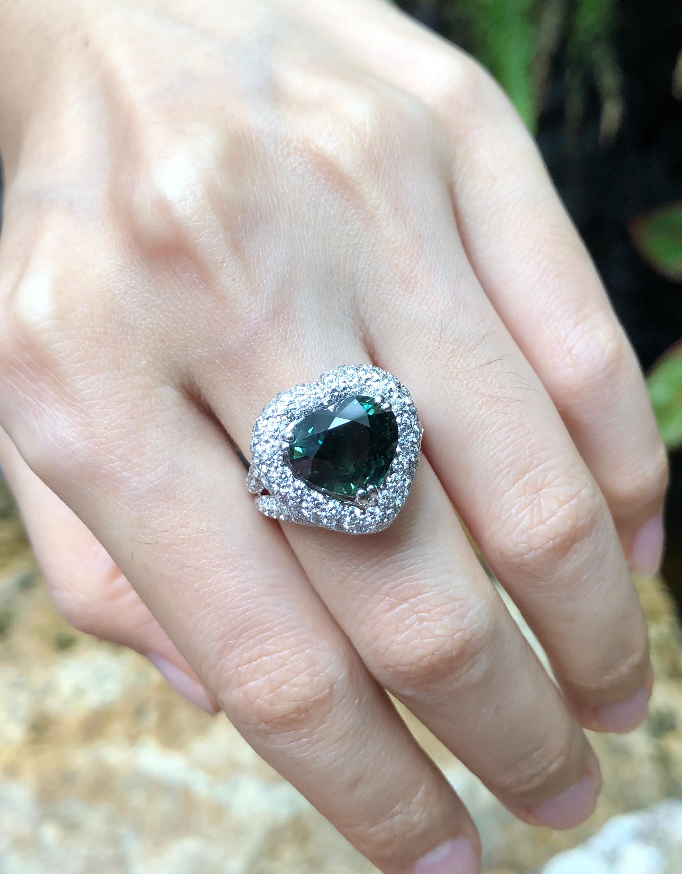 Green Sapphire 5.04 carats with Diamond 2.07 carats Ring set in 18 Karat White Gold Settings

Width:  1.7 cm 
Length:  1.6 cm
Ring Size: 51
Total Weight: 9.18 grams

