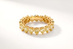 Heart-Shape Natural Fancy Yellow Diamond Eternity Band in 18 Karat Yellow Gold