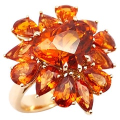Bague en or rose 18 carats sertie d'un saphir orange en forme de cœur