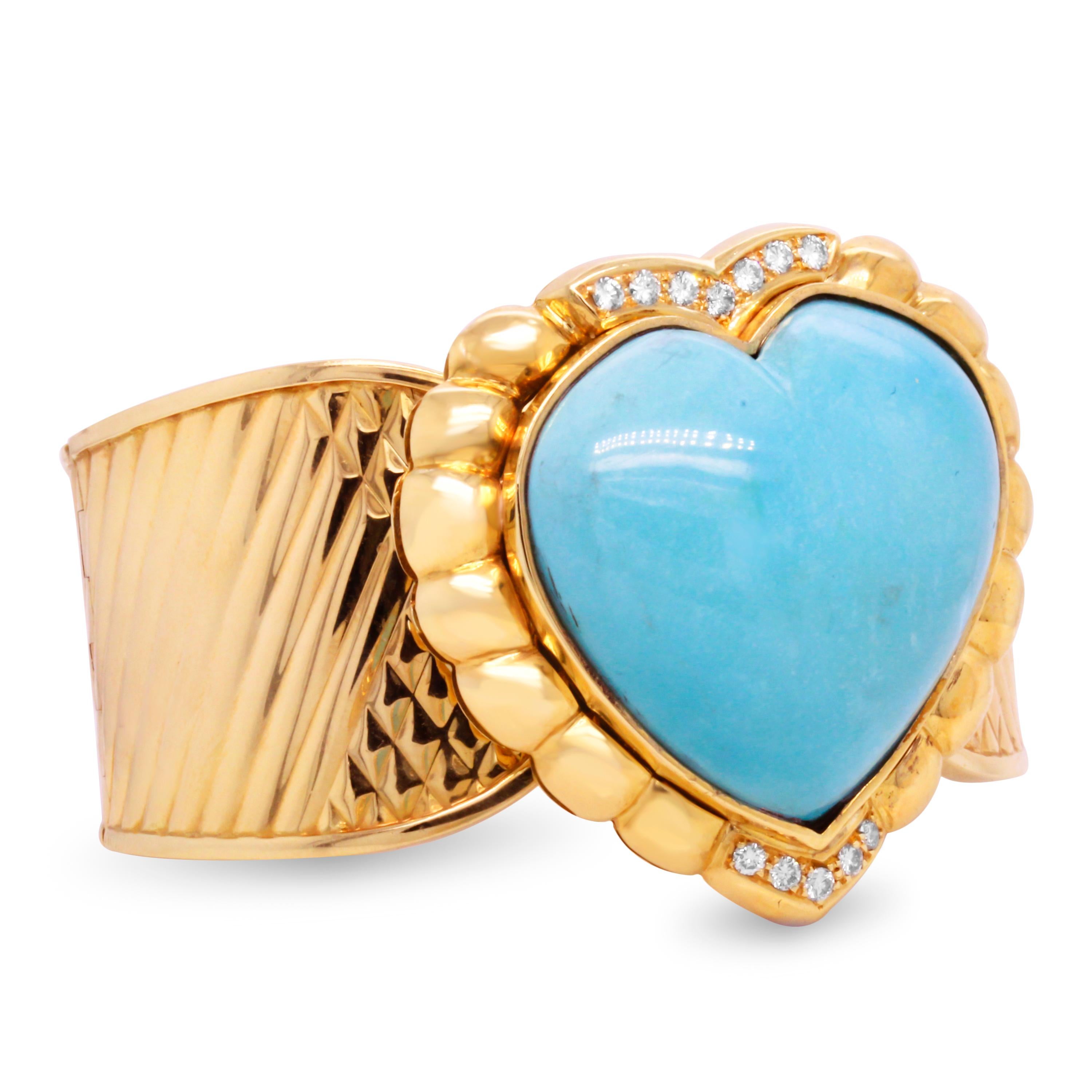 Heart Shape Persian Turquoise 18K Yellow Gold and Diamond Large Cuff Bracelet

This one-of-a-kind cuff features a special-cut, heart shape, Persian Turquoise center with diamonds on top and underneath.

The cuff bracelet has a waved, unique pattern