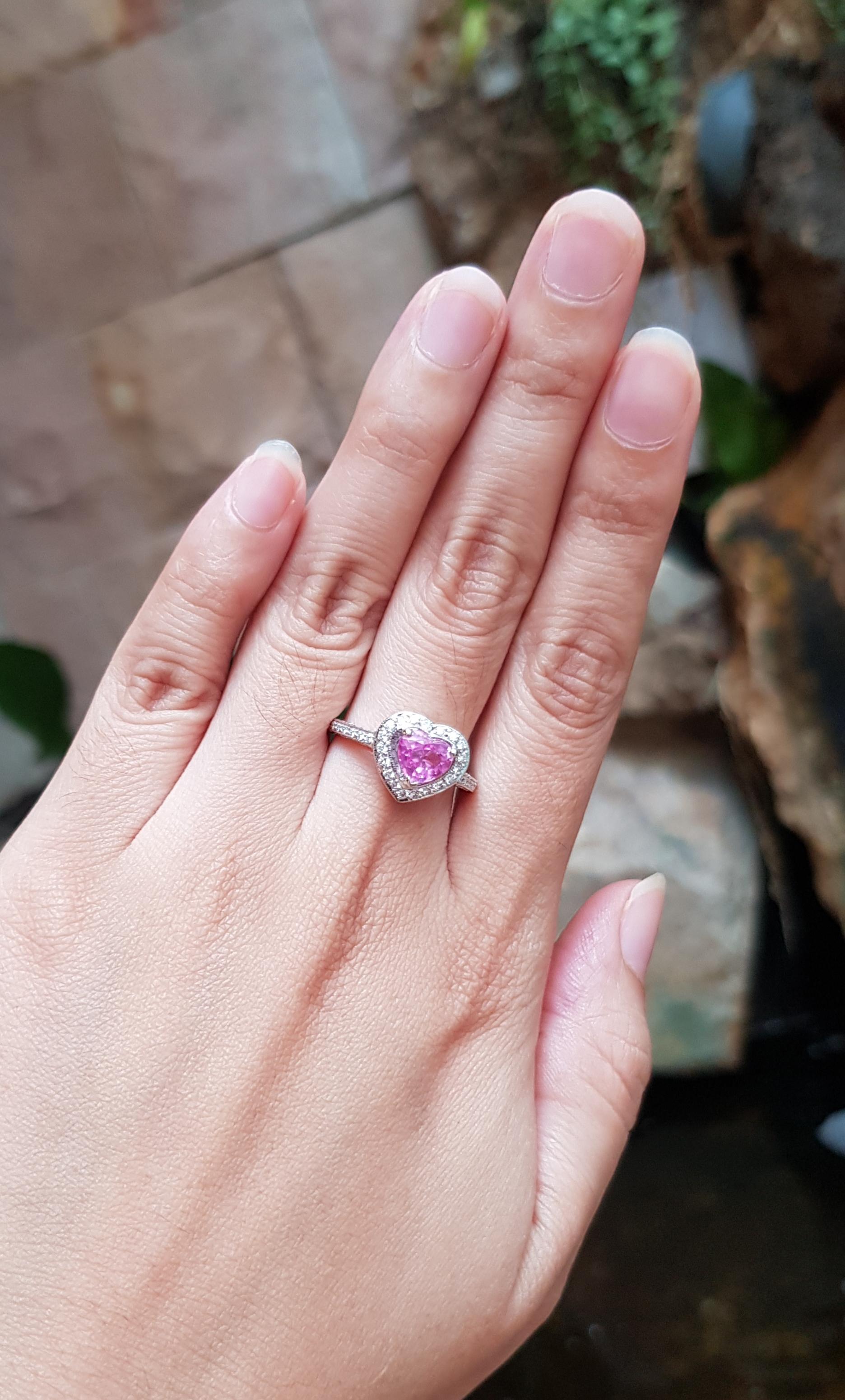 Pink Sapphire 1.15 carats with Diamond 0.54 carat Ring set in 18 Karat White Gold Settings

Width:  1.1 cm 
Length: 1.0 cm
Ring Size: 53
Total Weight: 4.66 grams

