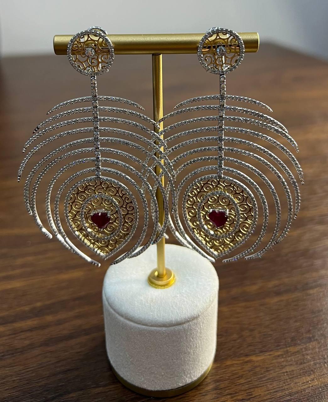 Heart Shape Ruby Diamond Halo Eastern Symbol Statement 18K White Gold Earrings In New Condition For Sale In Oakton, VA