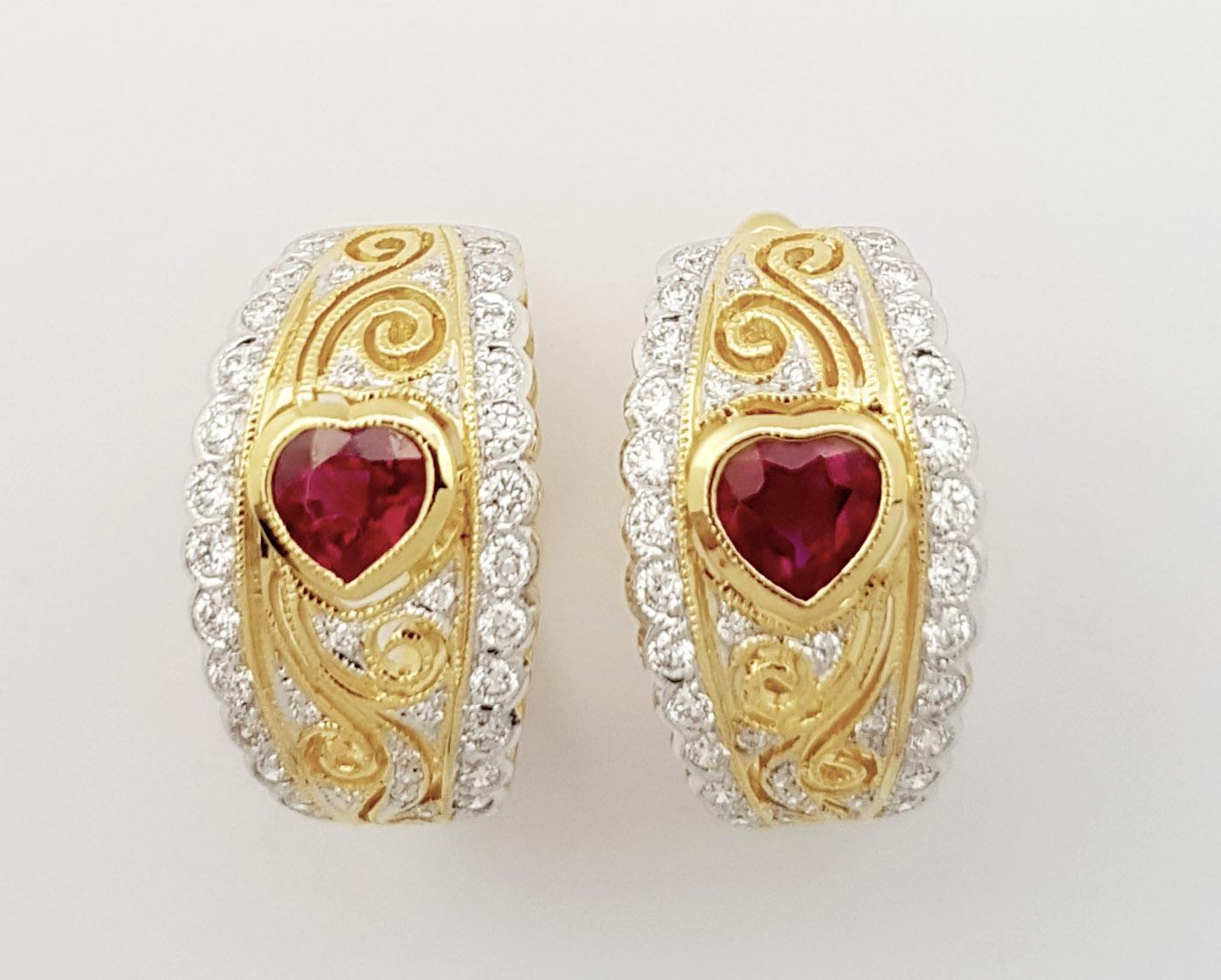 Ruby 0.95 carat with Diamond 0.62 carat Earrings set in 18K Gold Settings

Width: 1.0 cm 
Length: 1.8 cm
Total Weight: 18.09 grams

