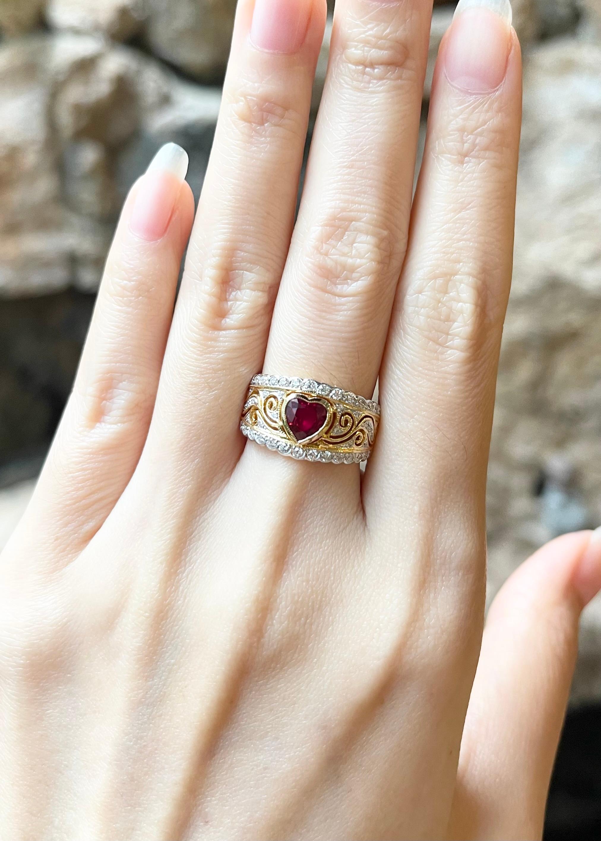 Ruby 0.95 carat with Diamond 0.39 carat Ring set in 18K Gold Settings

Width:  1.9 cm 
Length: 1.1 cm
Ring Size: 53
Total Weight: 7.45 grams

