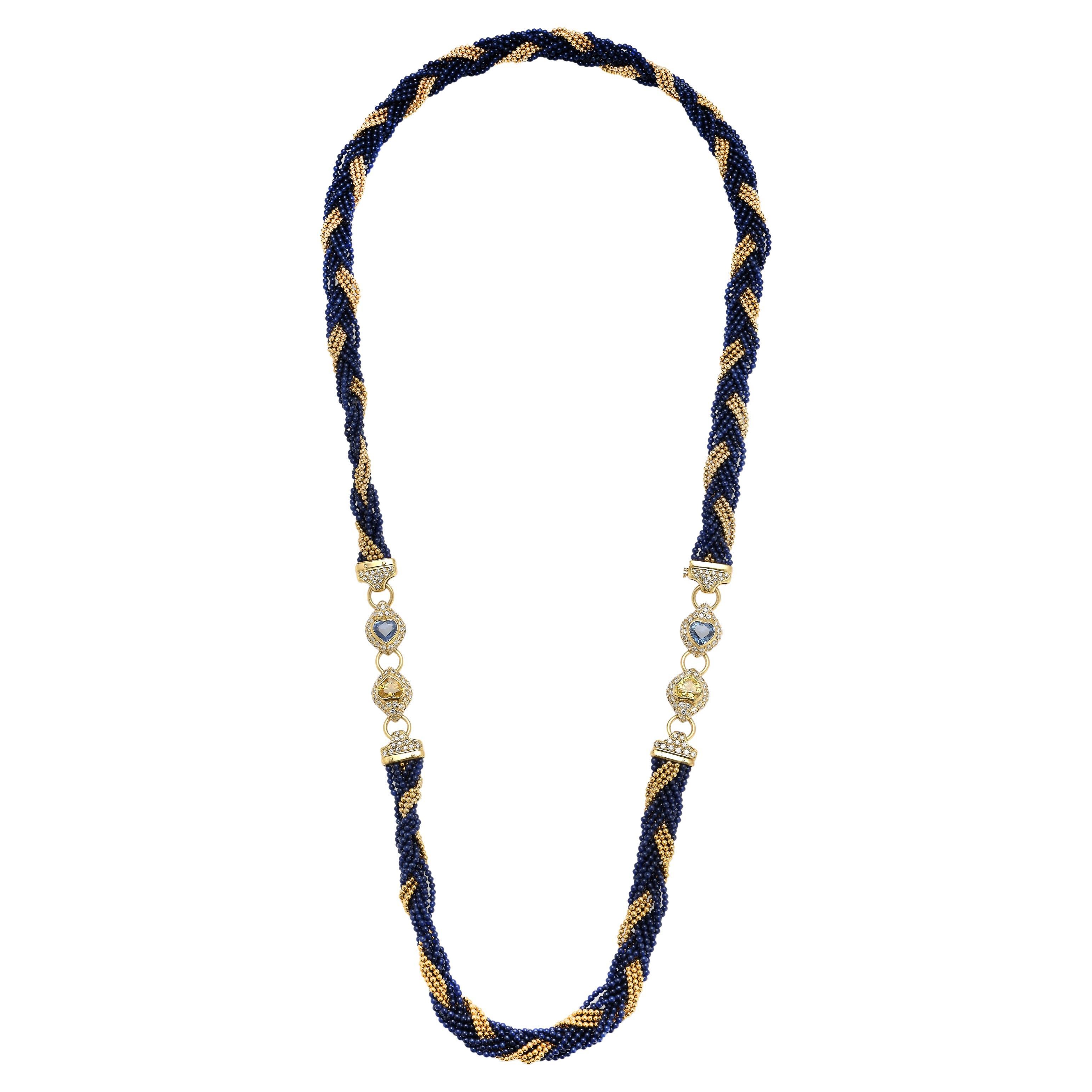 Collier de perles en or et diamants en forme de cœur avec saphirs