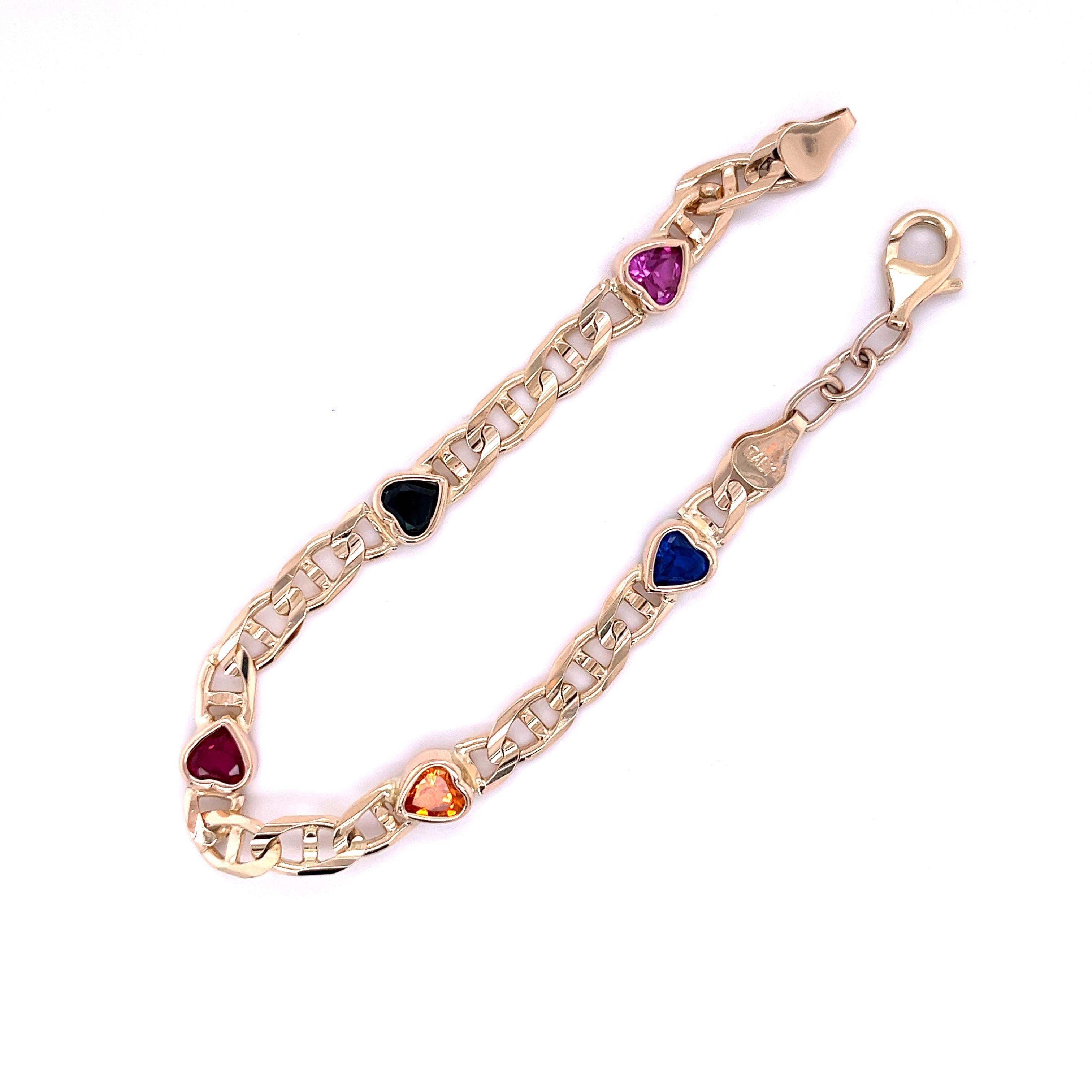 Heart-shaped multi-gemstone (Blue Sapphire, Pink Sapphire, Ruby, Peridot, and Citrine) charm bracelet with lobster closure. Set in 14K Yellow Gold, this charming bracelet captures all the colors of love and friendship. Made in Italy. 

This bracelet