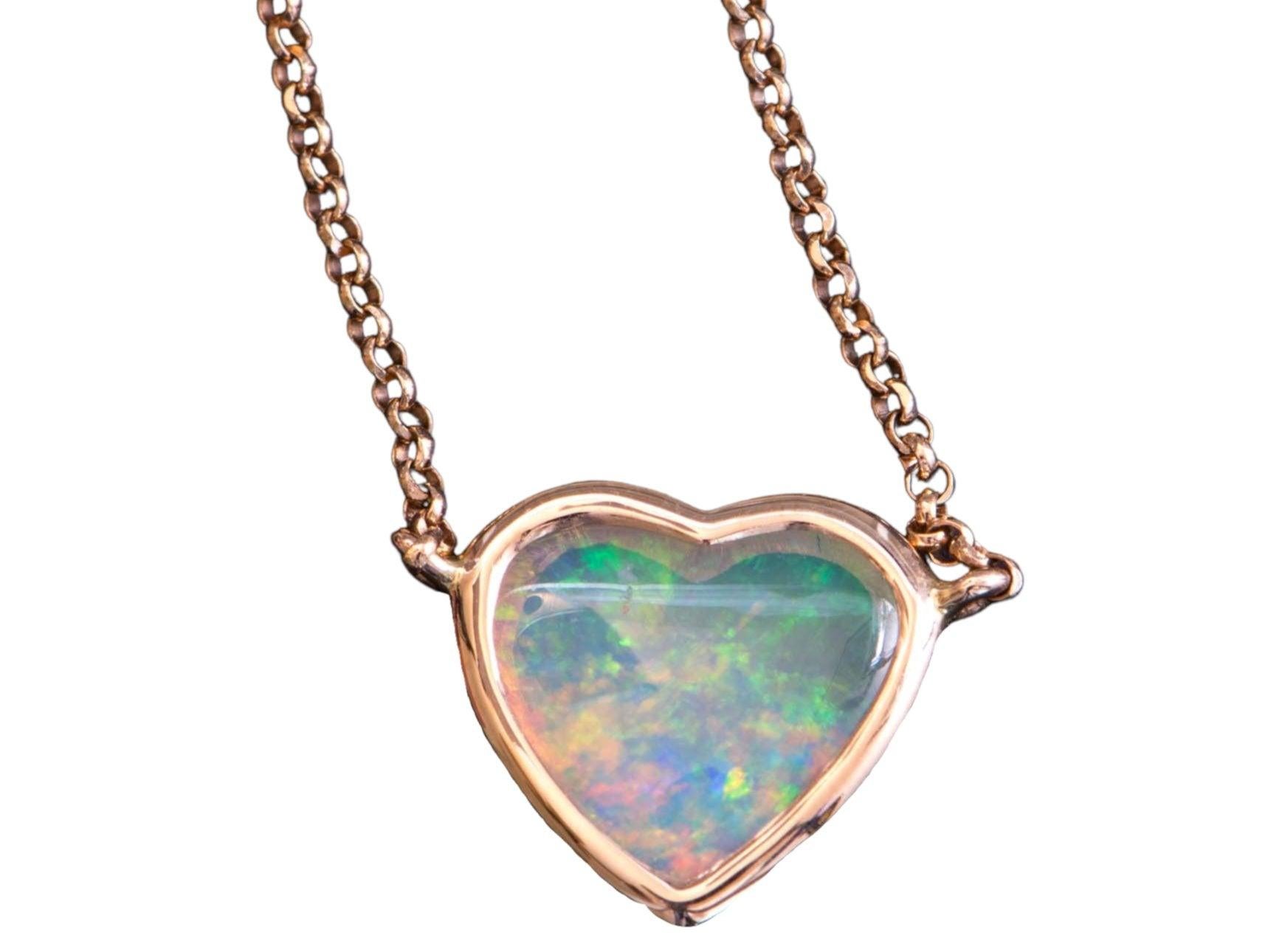 ♥ Heart-shape Solid Australian Crystal Opal Bezel Set Necklace 14K Rose Gold Pendant

♥ Solid 14k rose gold pendant set with a beautiful -shaped
♥ Gorgeous color!
♥ The item measures 10.2 mm in length, 9.7 mm in width, and stands 2.9 mm thick

♥