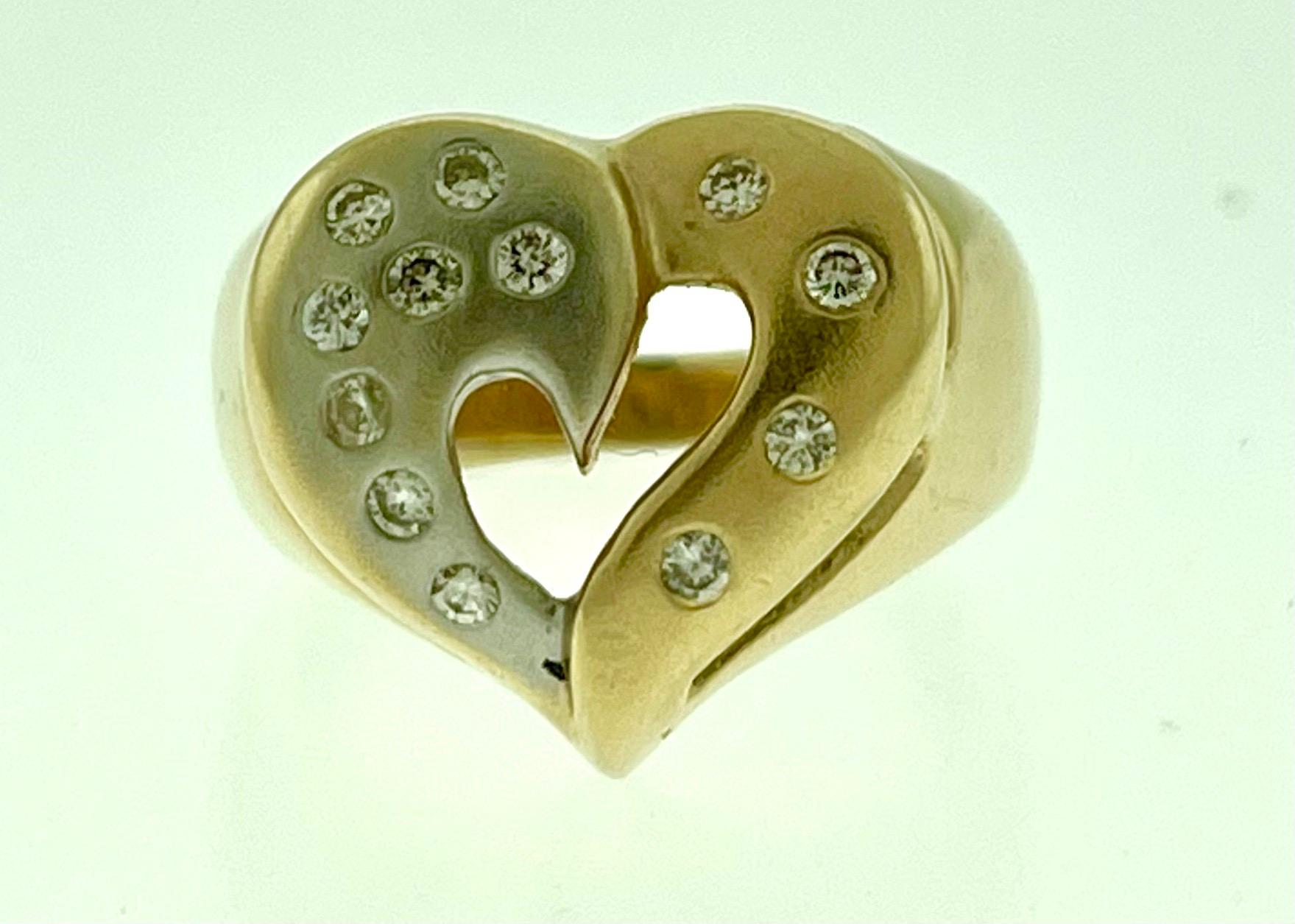 Heart Shape Two Tone Gold Diamond Cocktail 14 Karat Gold Ring Size 5 1/2
14 K gold Stamped 9.0 Grams. 
Diamond Eye clean 
There are brilliant cut Round diamonds in the ring 

Ring size is approximately 5 1/2 but can be altered to any size.
Very