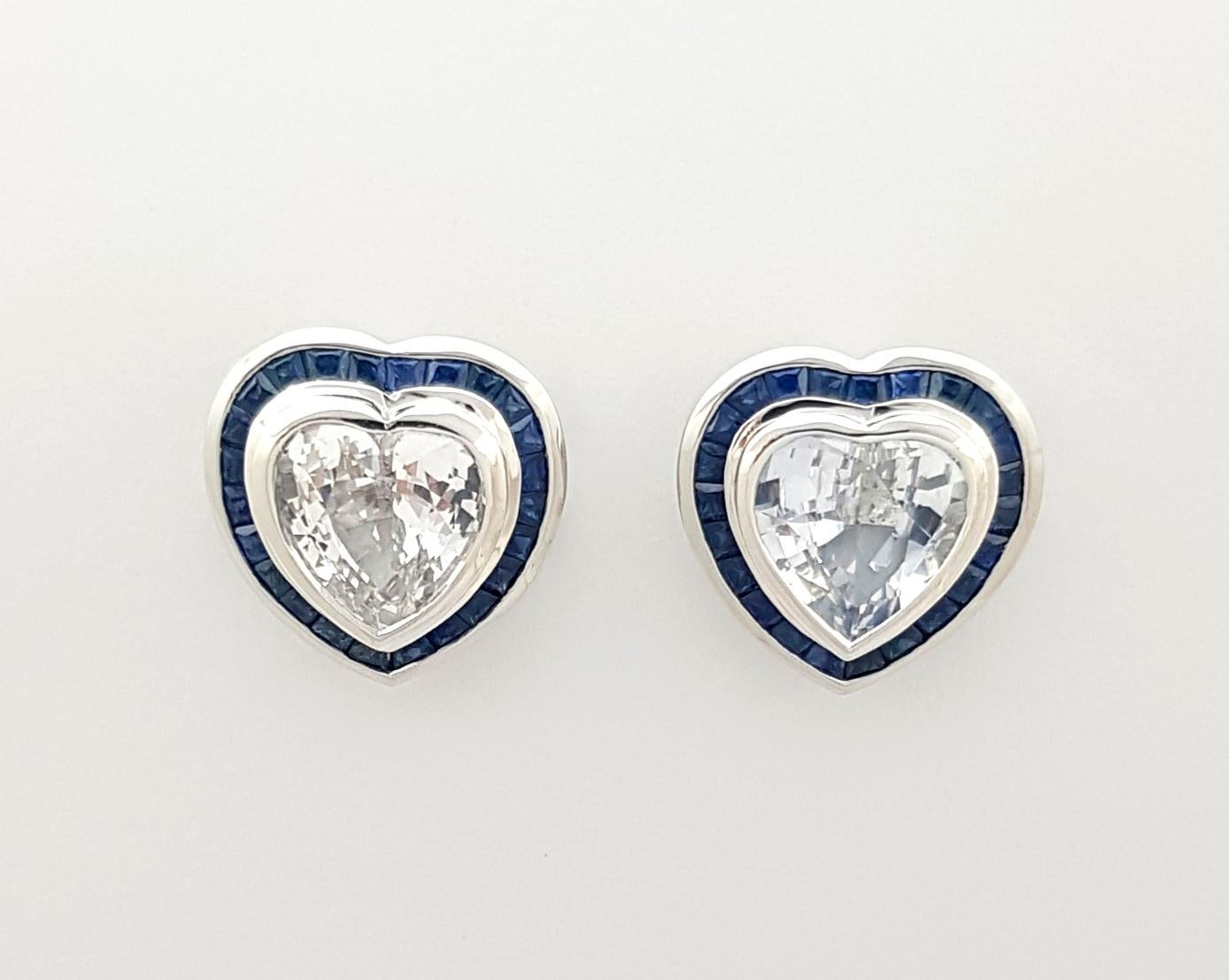 Contemporary Heart Shape White Sapphire with Blue Sapphire Earrings Set in 18k White Gold For Sale