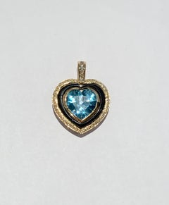 Pendentif en forme de cœur en or jaune 9 carats, topaze bleue de 10 carats et diamants