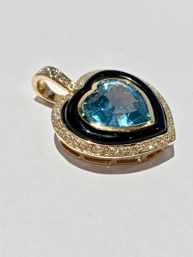 Heart Shaped 10 Carat Blue Topaz Onyx and Diamond Pendant in 9 Carat ...