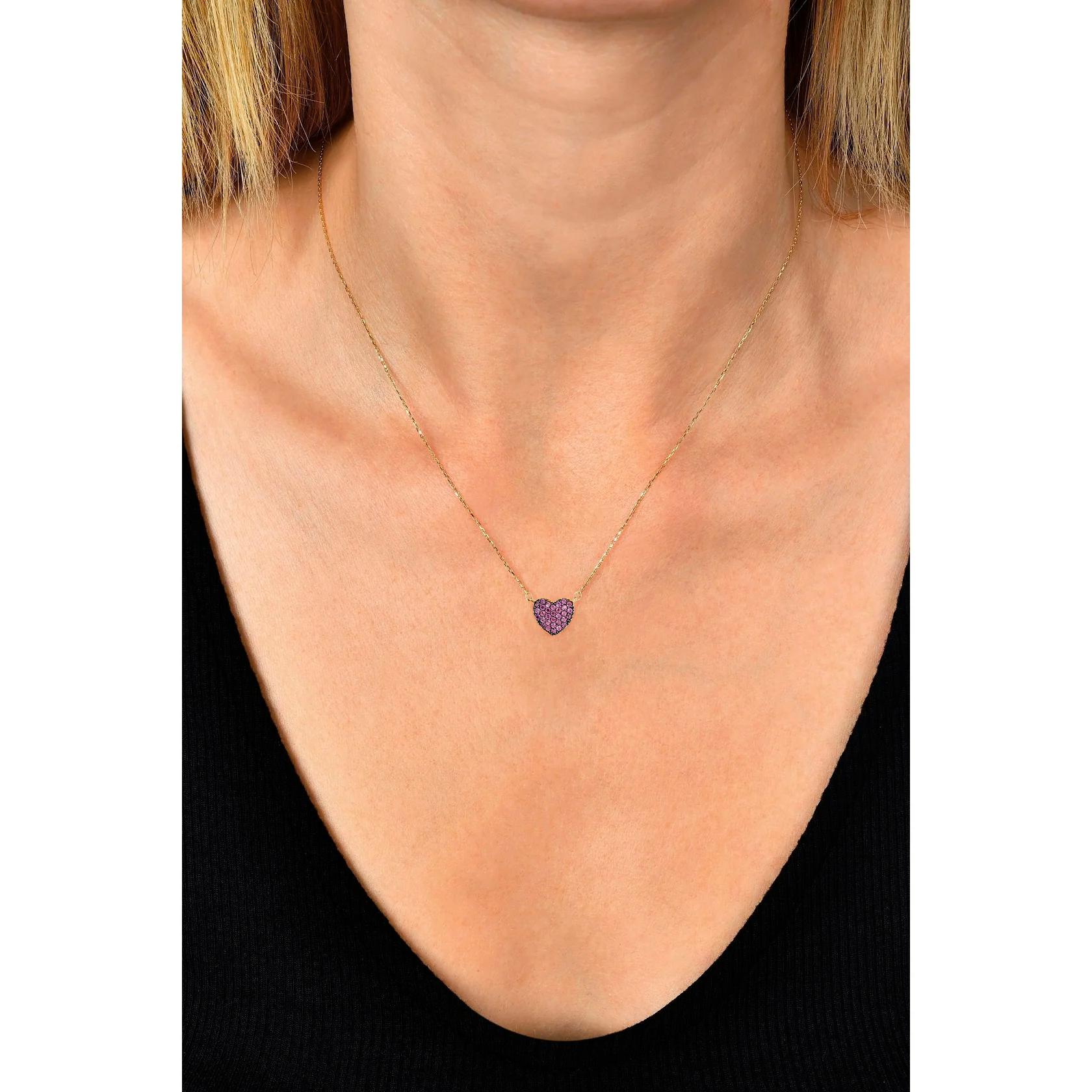 Heart shaped 14k gold pendant necklace.  3