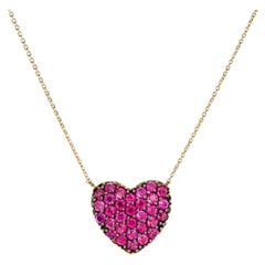 Heart shaped 14k gold pendant necklace. 