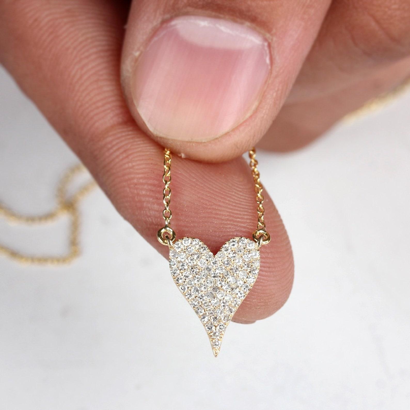 Heart Shaped 14k Solid Yellow Gold Natural Pave Diamond Necklace Gift for Women.

Pendant width: 14 Millimetres

Pendant height: 20 Millimetres

Necklace length: 18 Inches

14k Gold wt: 2.50 Gm

Diamond wt: 0.26 Ct

Pendant Size: 20 x 14 MM

Chain: