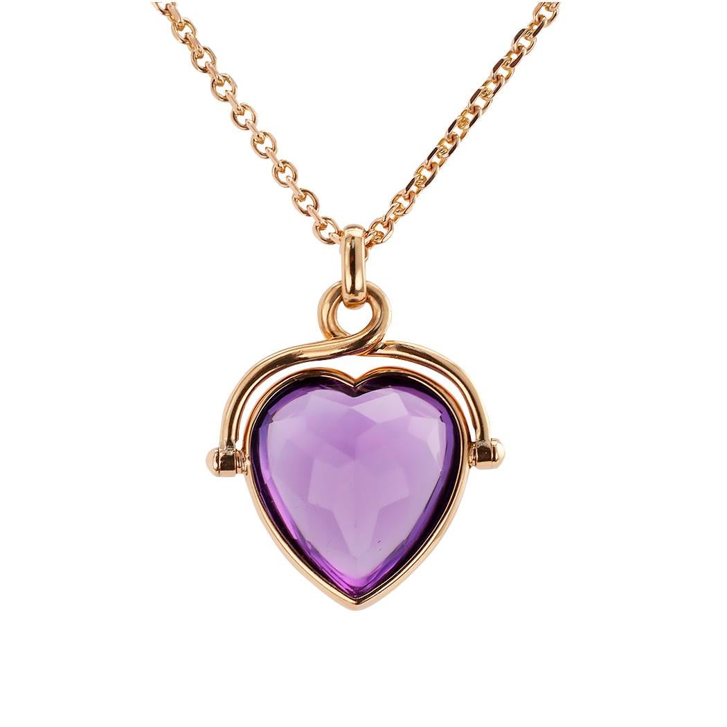 Vintage heart-shaped amethyst and rose gold pendant necklace circa 1930.

DETAILS:

GEMSTONES:  one buff-topped, heart-shaped amethyst weighing approximately 12.50 carats.  Buff-topped = smooth polished top surface, faceted on the underside, visible