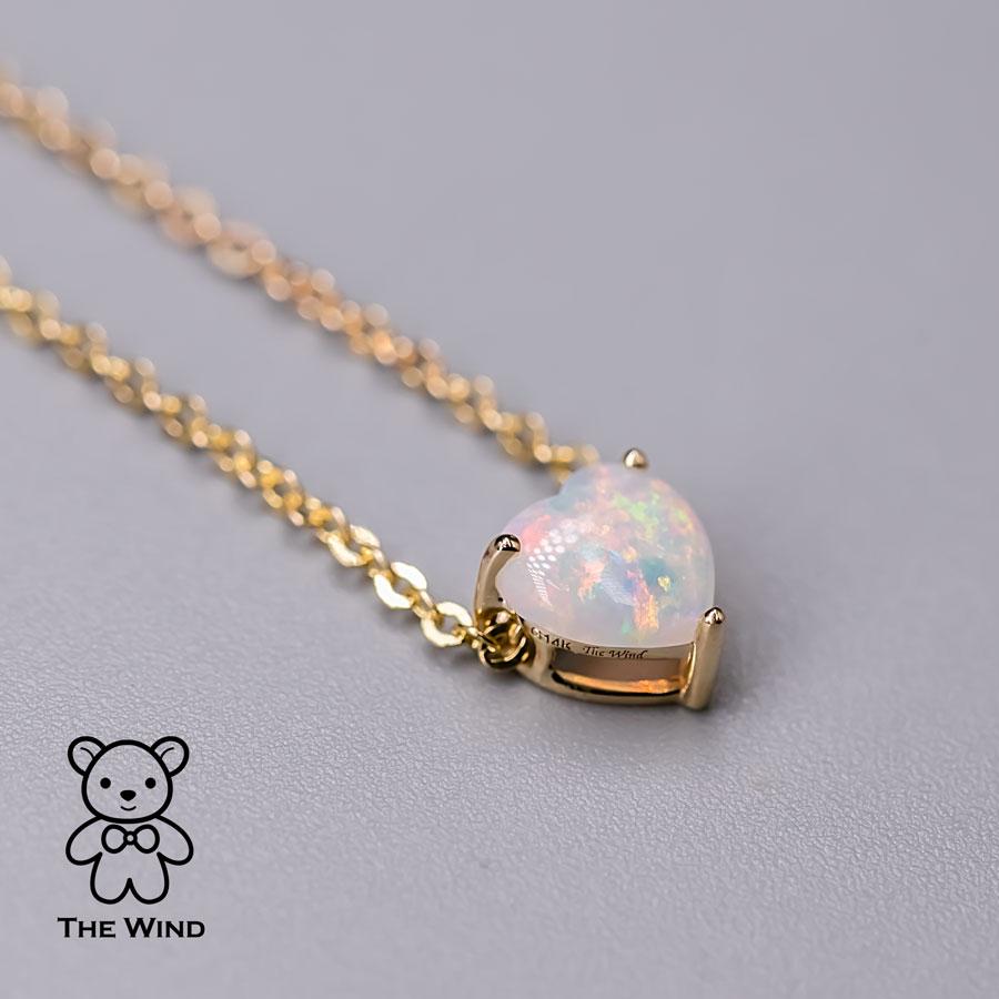 Collier d'opales australiennes massifs en forme de cœur en or jaune 14 carats Unisexe en vente
