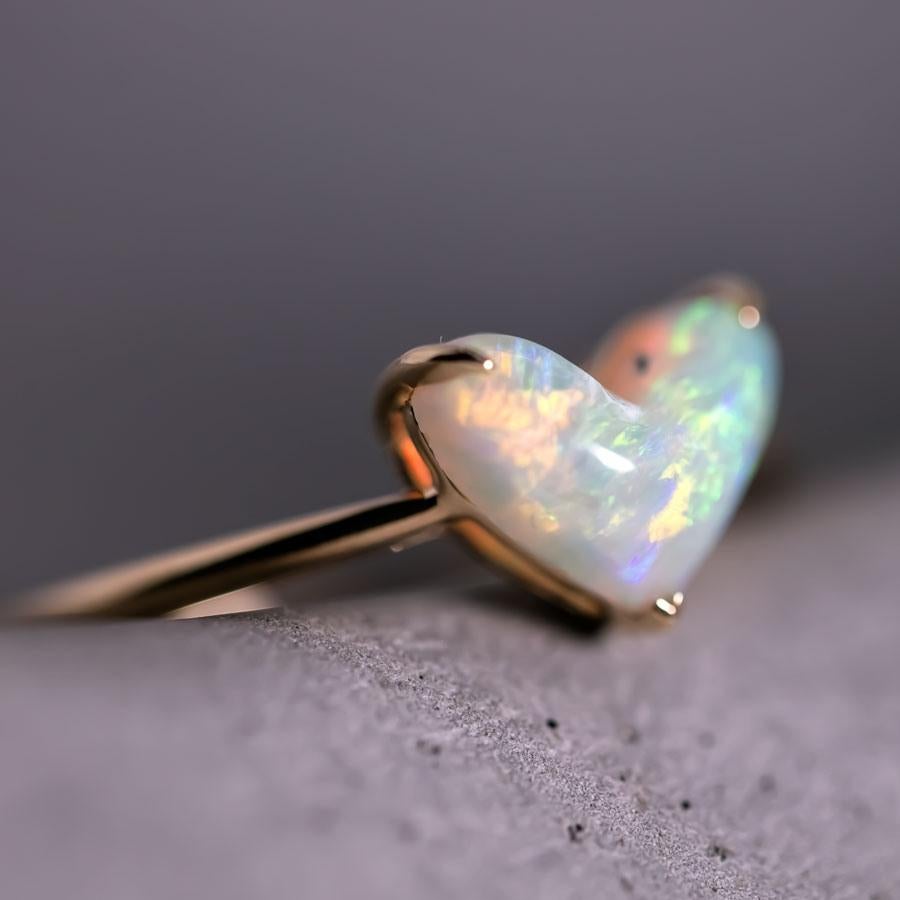 Heart Shaped Australian White Opal Engagement Ring 18K Yellow Gold.


Free Domestic USPS First Class Shipping! Free Gift Bag or Box with every order!

Opal—the queen of gemstones, is one of the most beautiful gemstones in the world. Every piece of