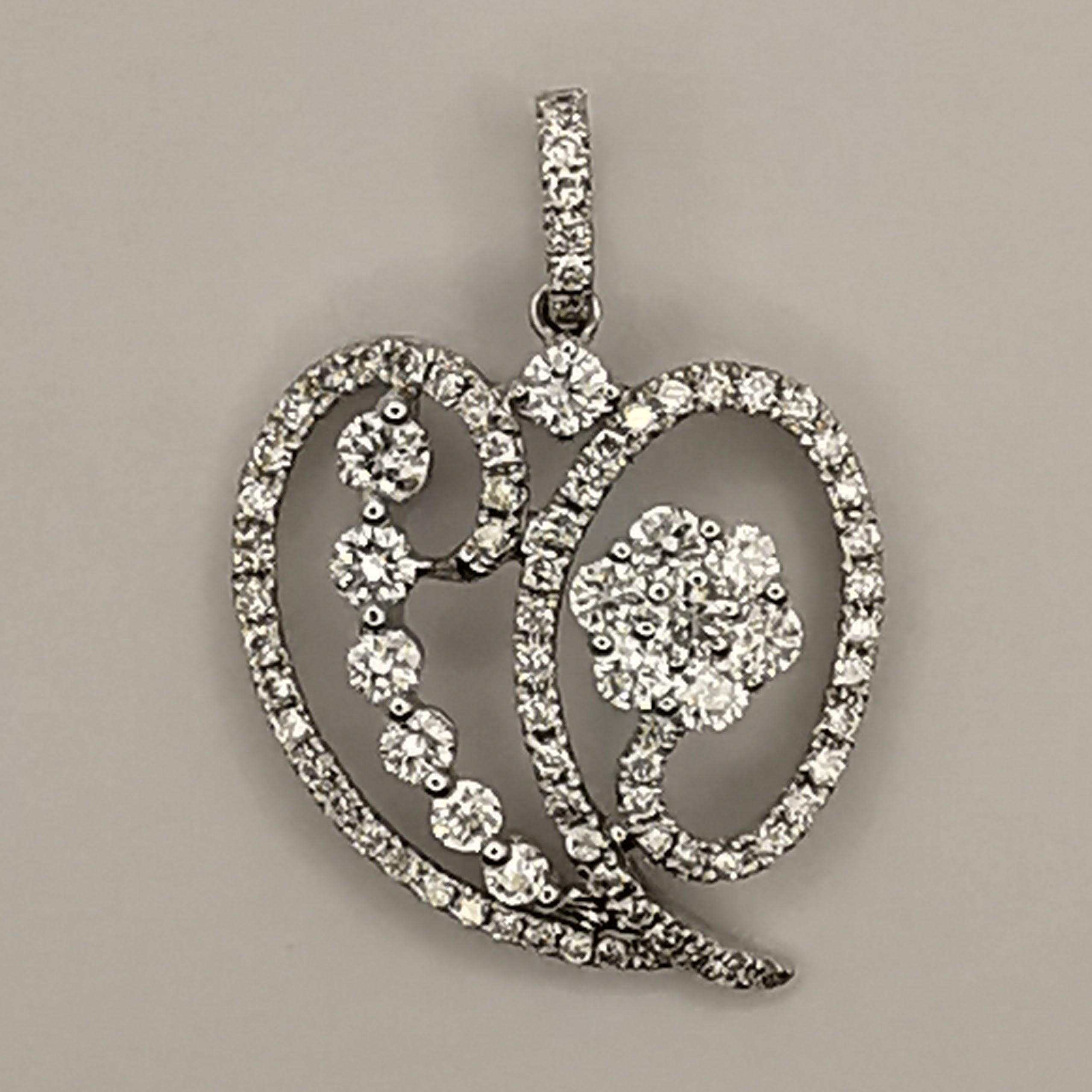 This unique and eye-catching pendant necklace features a heart-shaped bell pepper design set with 0.97 carats of diamonds. The pendant is made of 18K white gold, making it comfortable and easy to wear.

The heart-shaped design and diamonds make this