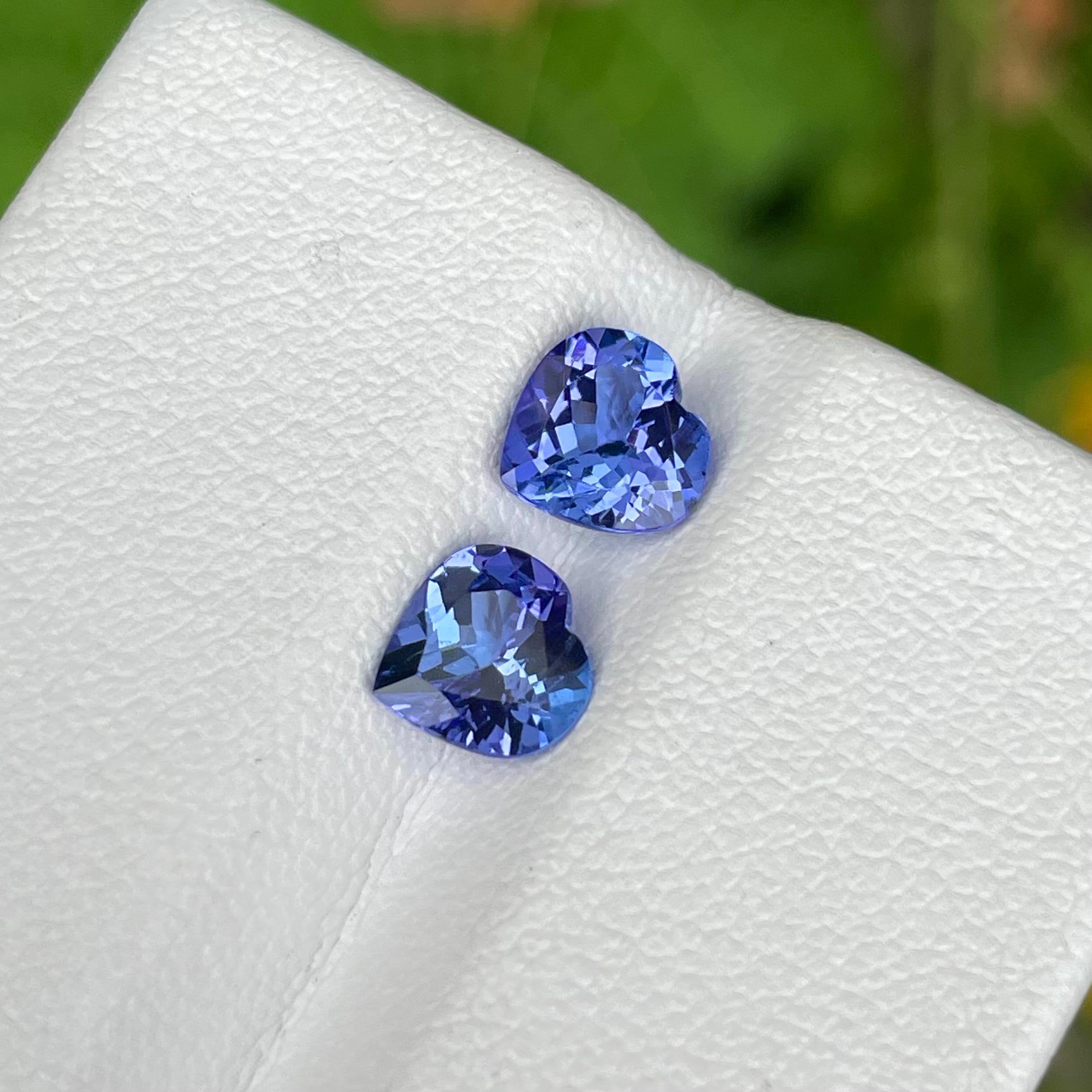 Weight 2.35 carats 
Dimensions 6.6 x 6.8 x 4.5 mm
Treatment Heated 
Origin Tanzania 
Clarity Eye Clean 
Shape Heart 
Cut Heart 



Introducing an exquisite pair of Heart Shaped Blue Tanzanite Stones, each weighing 2.35 carats, and sourced directly