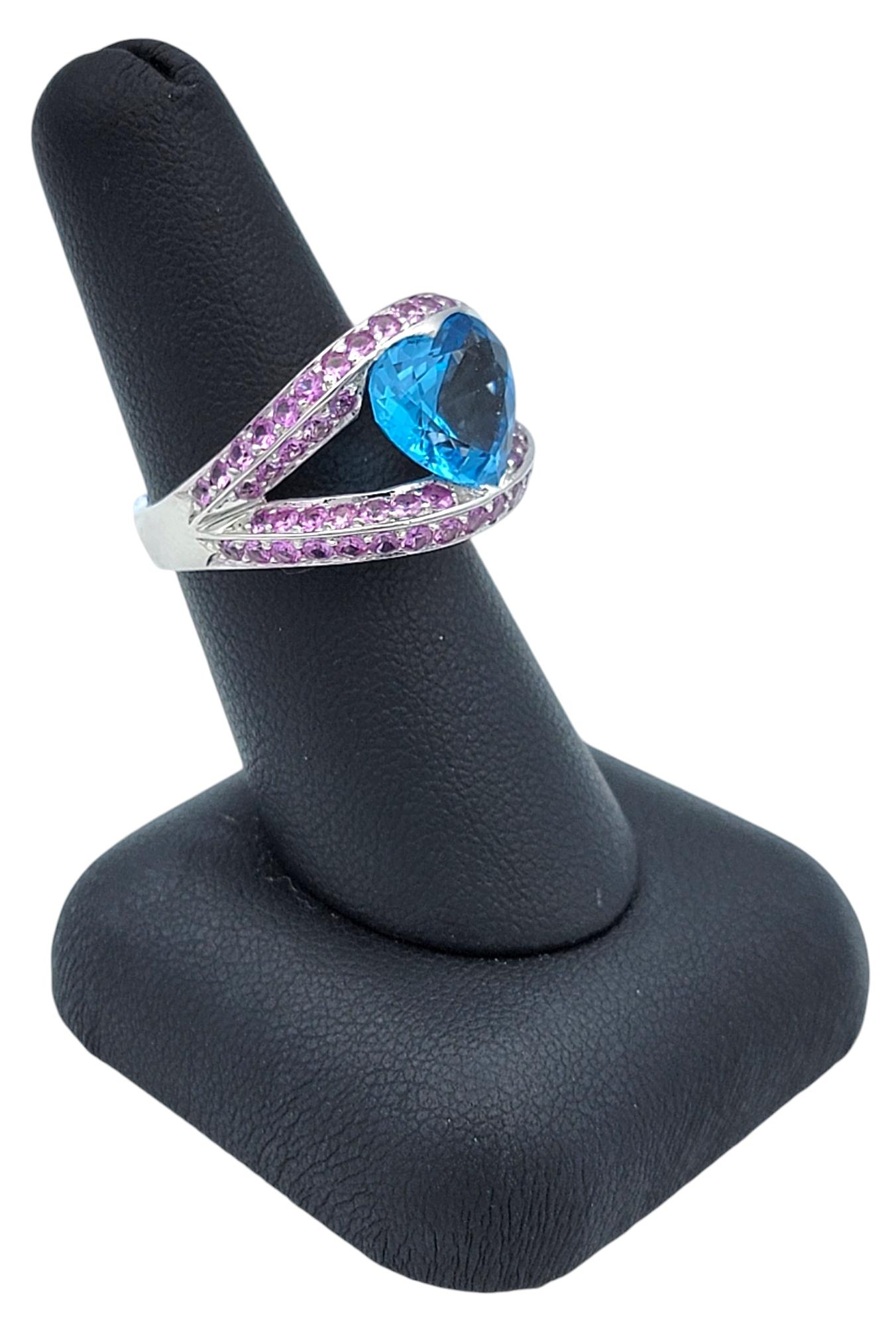 Heart Shaped Blue Topaz Split Shank White Gold Cocktail Ring with Pink Sapphires For Sale 6