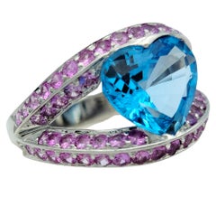 Heart Shaped Blue Topaz Split Shank White Gold Cocktail Ring with Pink Sapphires
