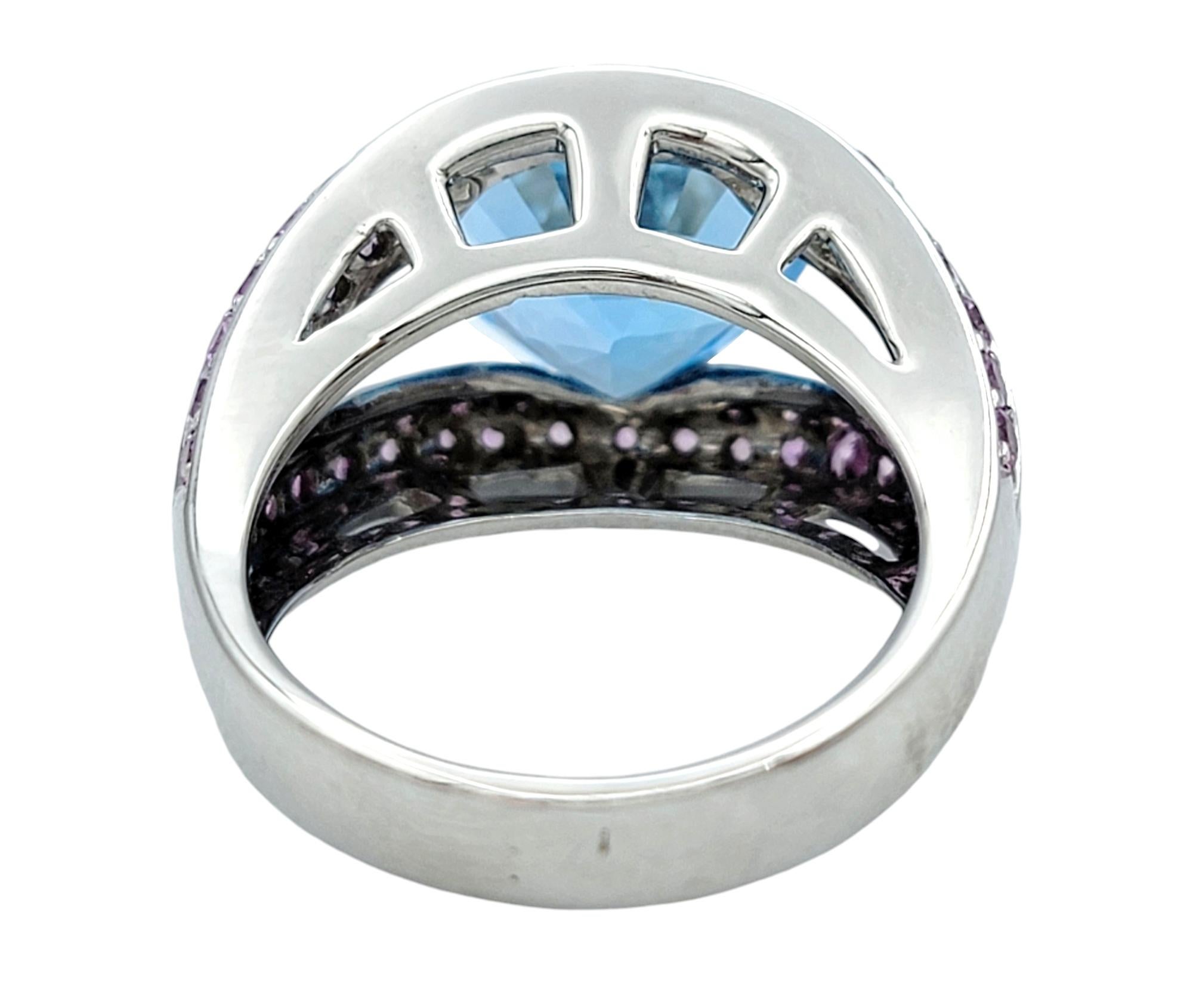 Women's Heart Shaped Blue Topaz Split Shank White Gold Cocktail Ring with Pink Sapphires For Sale