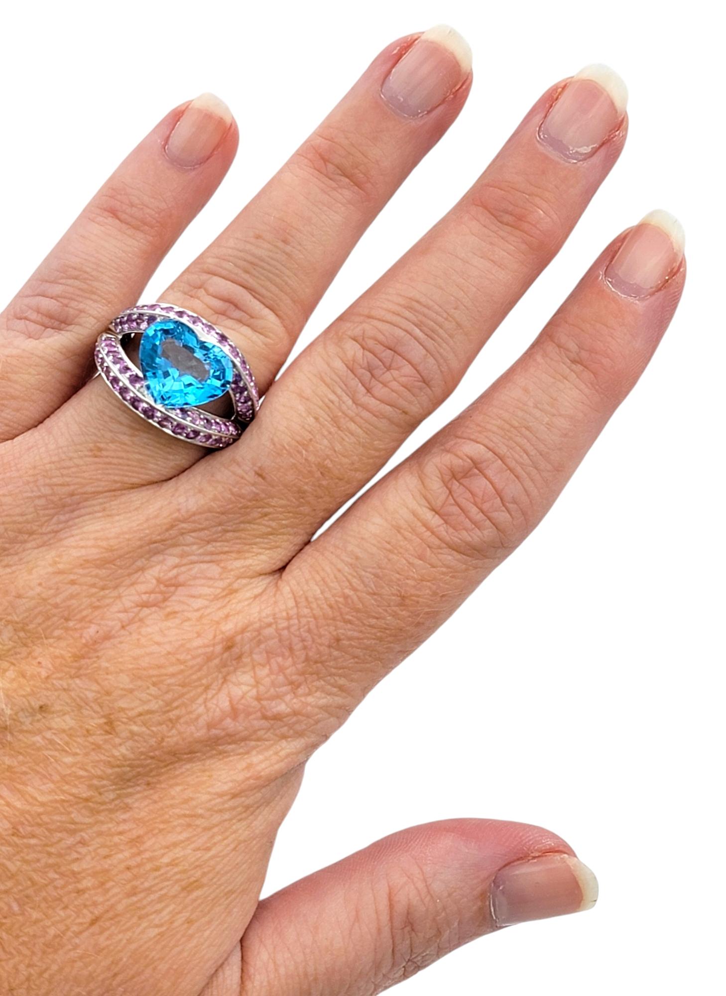 Heart Shaped Blue Topaz Split Shank White Gold Cocktail Ring with Pink Sapphires For Sale 3