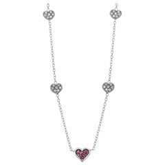 White Gold Heart Shaped Ruby Charm and Five Diamond Station Charms Neck