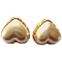   Heart shaped Chanel ear clip, faux pearl, signed 2CC8, gold plated