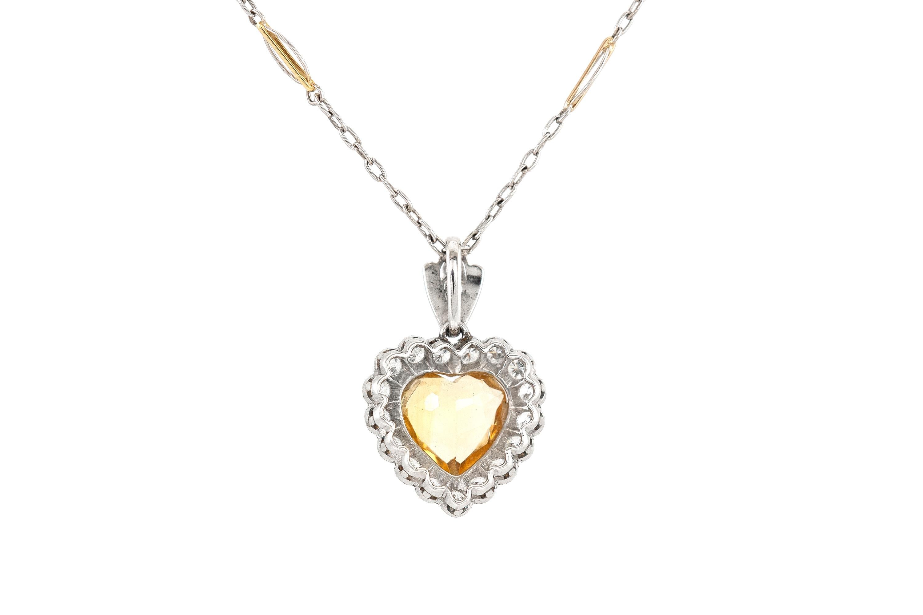 The necklace is finely crafted in 14k white gold, a citrine stone and diamonds weighing a total of 0.50 dwt. Circa 1970.