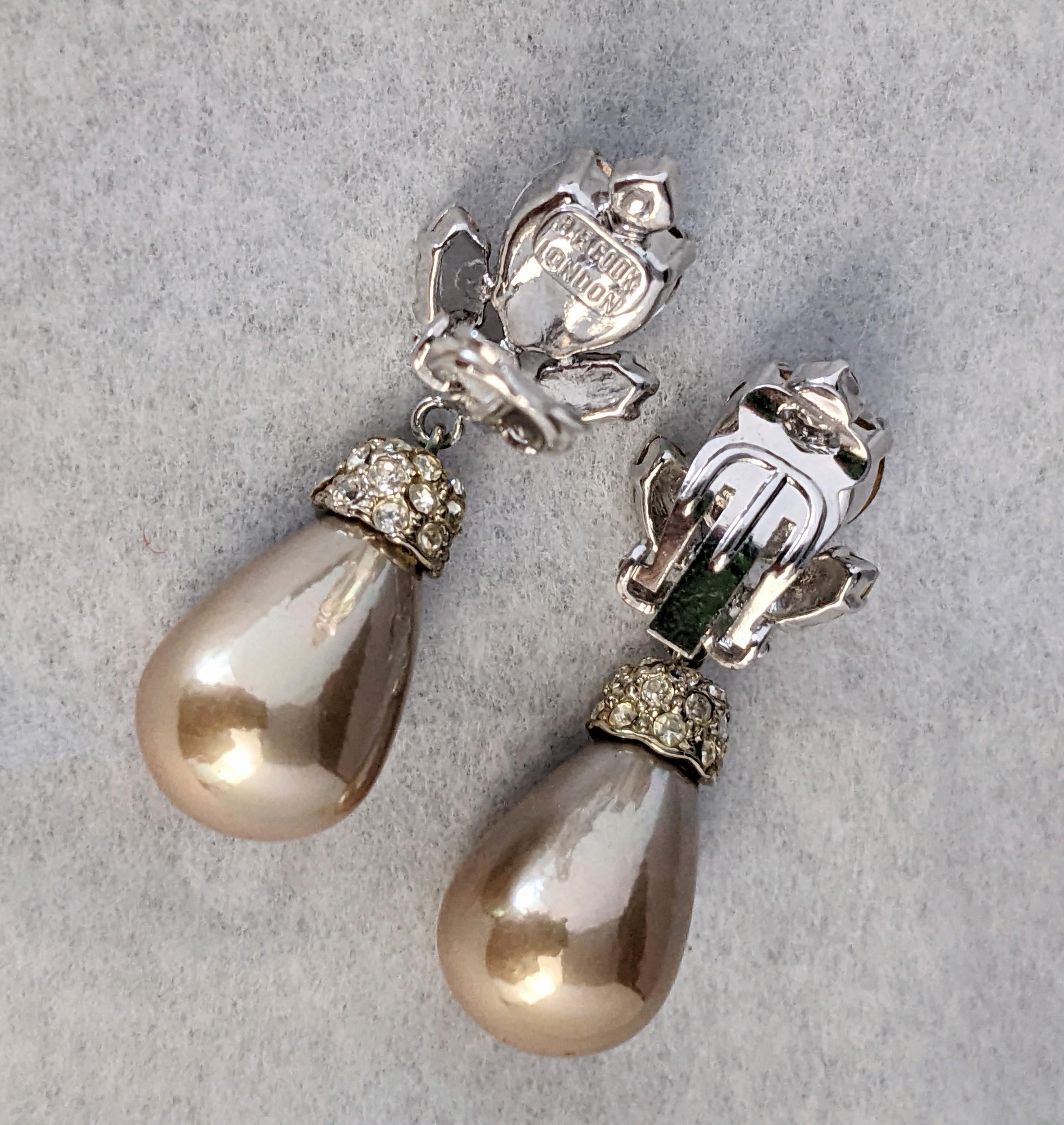 Charming Heart Shaped Crystal Earrings, B. Cook, London from the 1990's. Unusual, high quality crystal earrings in the Dior style with faux champagne pearl drops with pave caps. Clip back fittings. Excellent condition. 1.75