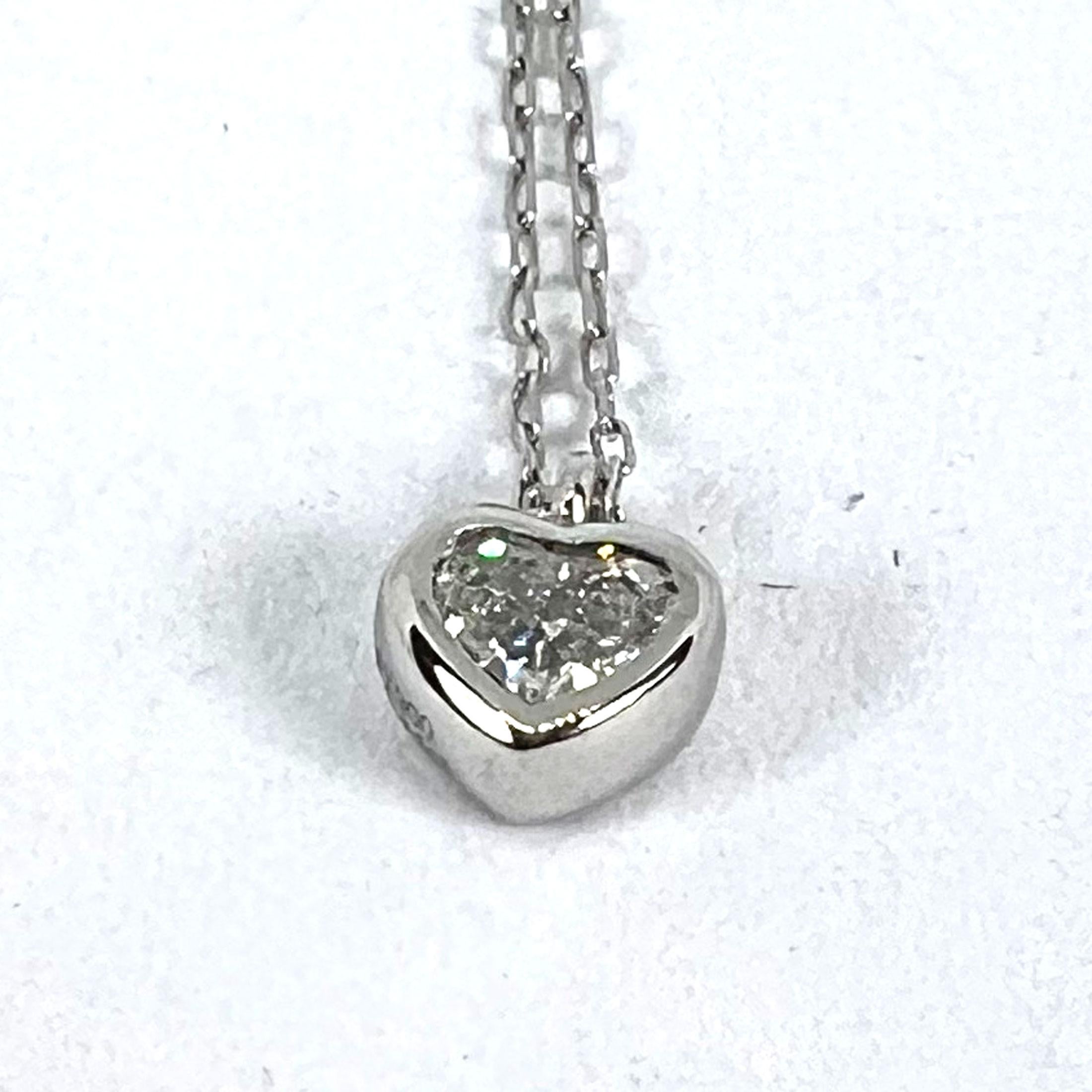 Collana con ciondolo in platino con diamante a forma di cuore da 0,14 carati in vendita 12