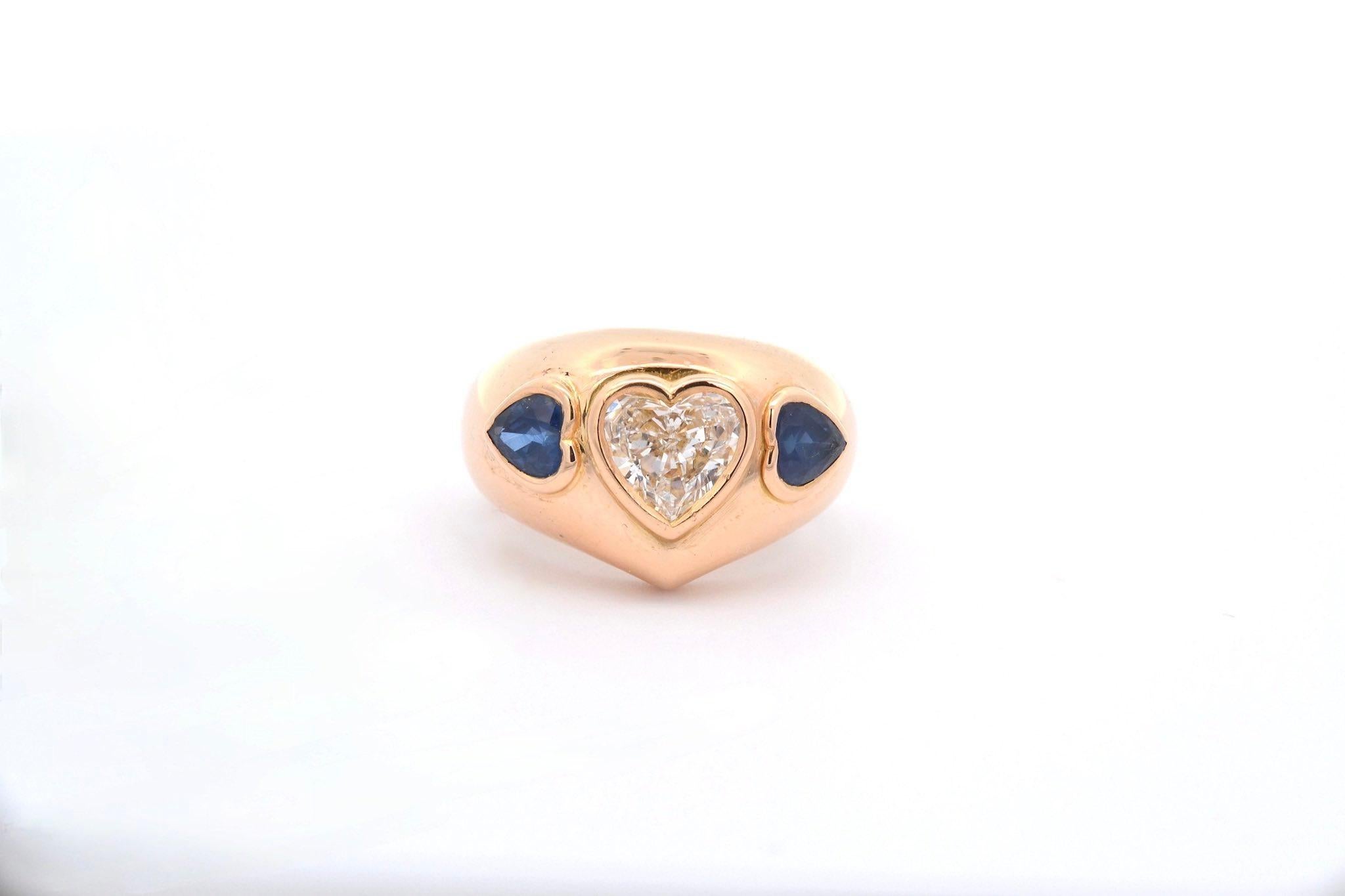 Stones: 1 diamond of 1.20 cts VS / H and 2 heart sapphires, Weight: 1.20 cts
Material: 18k yellow gold
Weight: 12.7g
Period: Recent
Size: 52 (free sizing)
Certificate
Ref. : 25050