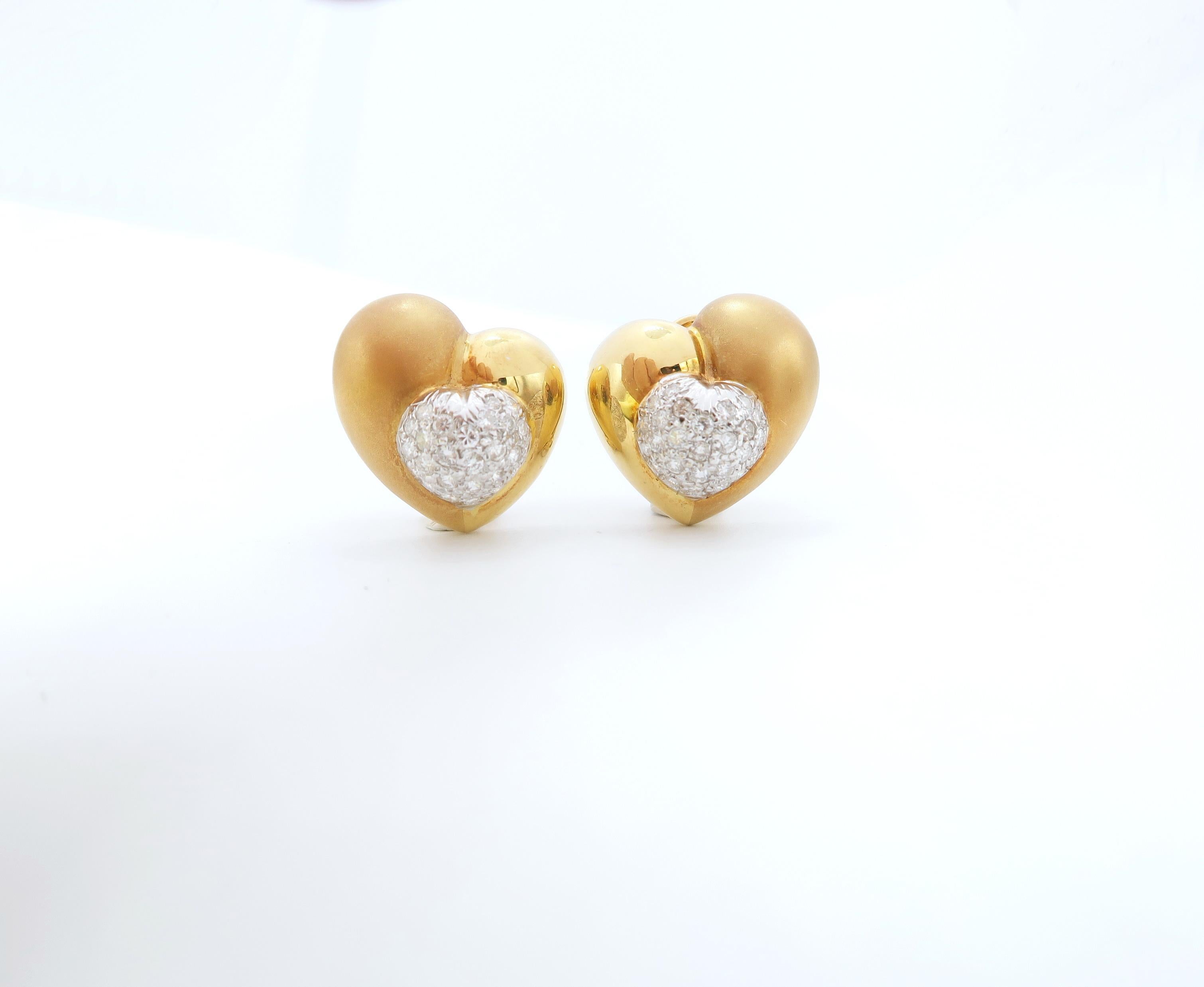 Heart Shaped 18K Gold Clip on Pierced Earrings with Diamond

Diamond : 1.15ct.
Gold : 18K Yellow Gold 13.35g.