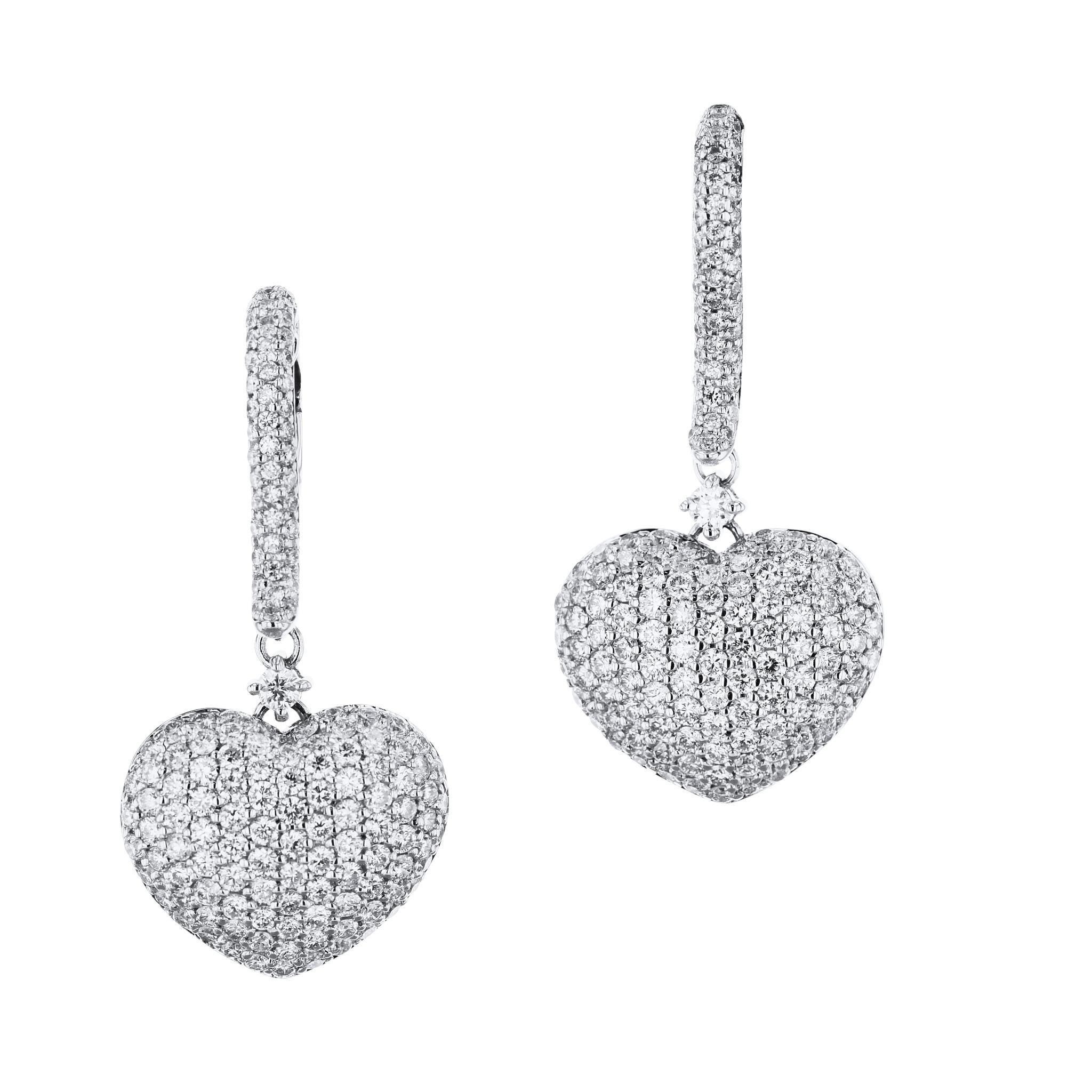 Featuring an exquisite design, these 18 karat White Gold Heart Diamond Pave Drop Earrings are the perfect way to make a bold statement! 
These stunning earrings measure 32 mm long and the heart is 15 mm at it's widest point.

-White Gold Heart