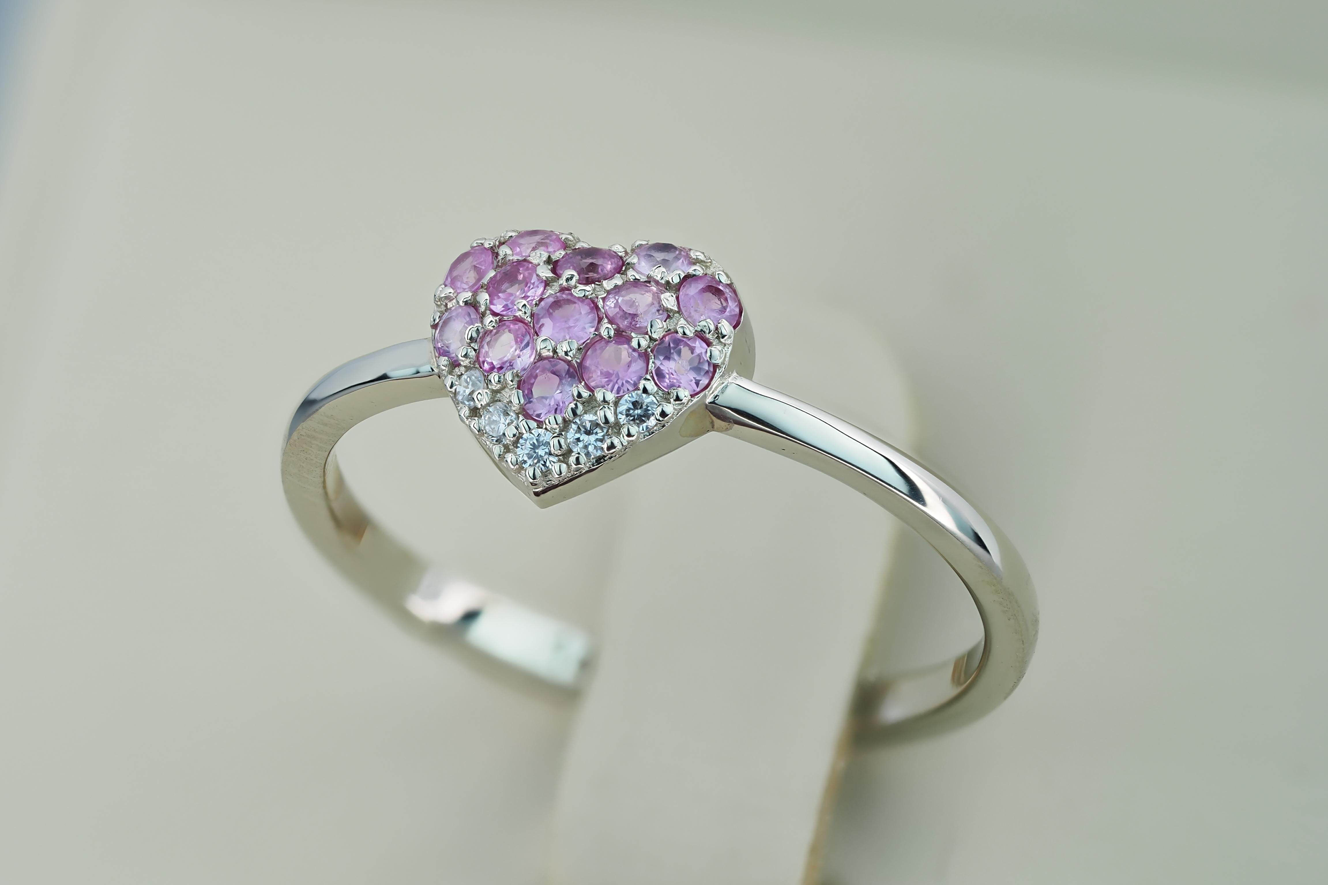 Modern Heart shaped gold ring with pink sapphires.  For Sale