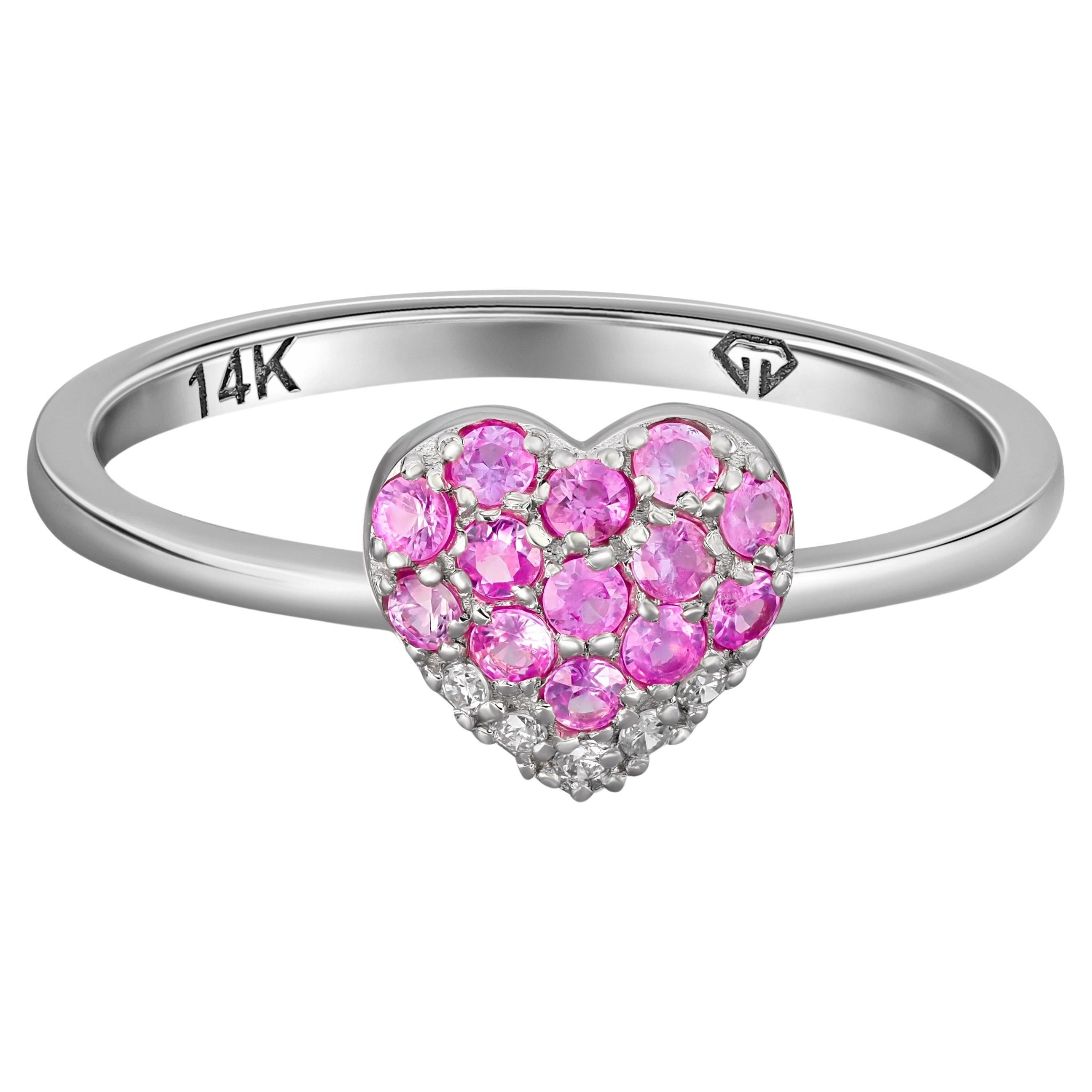 Heart shaped gold ring with pink sapphires.  For Sale