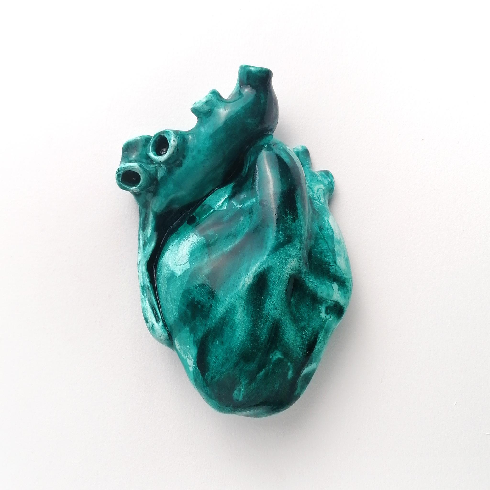 Celebrating the human body by dissecting it. The human body as a great system of signs and symbols. We are expression, beyond words and gestures. 

A perspective of the flesh in which certain parts become containers. 
Here then are hearts made