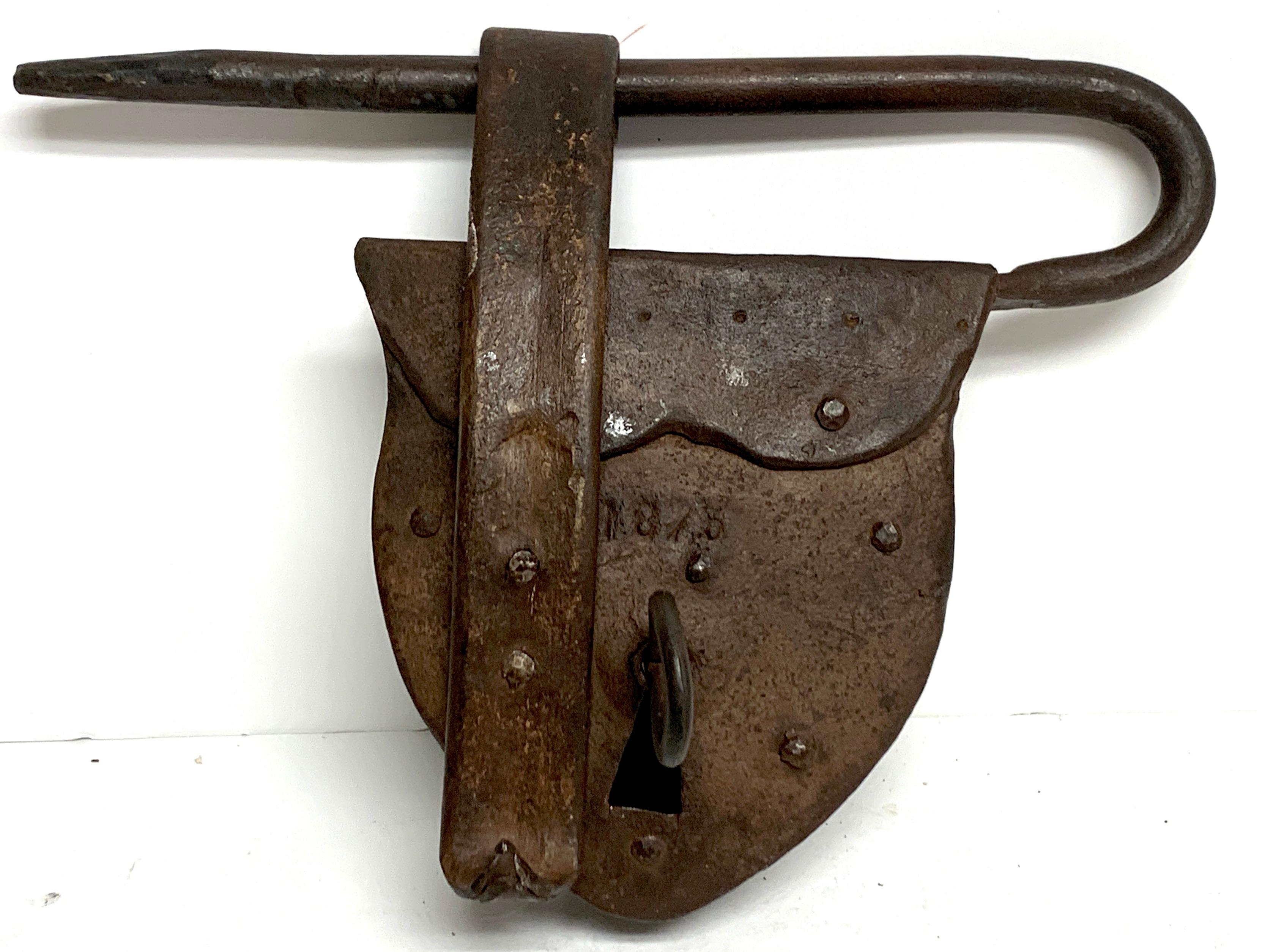 Heart shaped iron pad lock & key, dated 1875, of large size made in three pieces, works. Complete with a 5.25