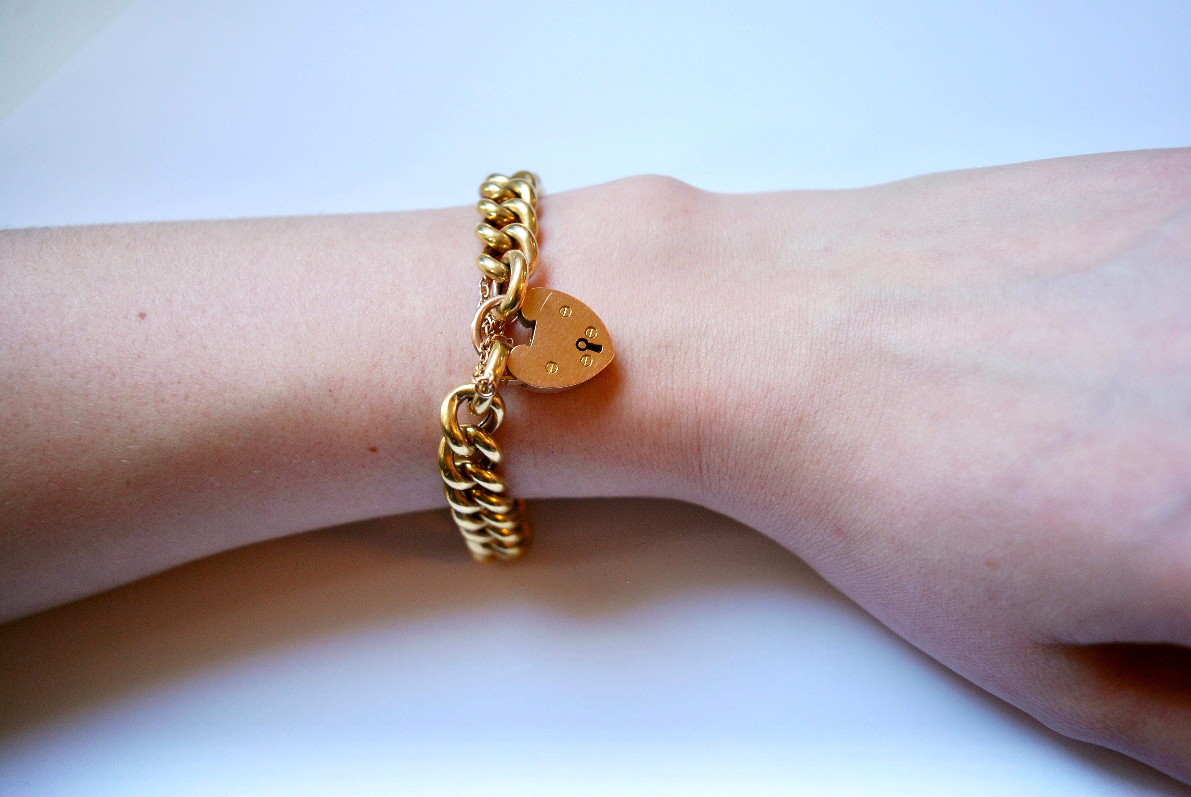 Late Victorian 15 carat gold chunky curb link bracelet with heart shaped padlock clasp
Condition: Very good
Date: Circa 1900
Weight: 22g
Size: 18cm
Hallmarks: Birmingham 1896, 15 carat gold

