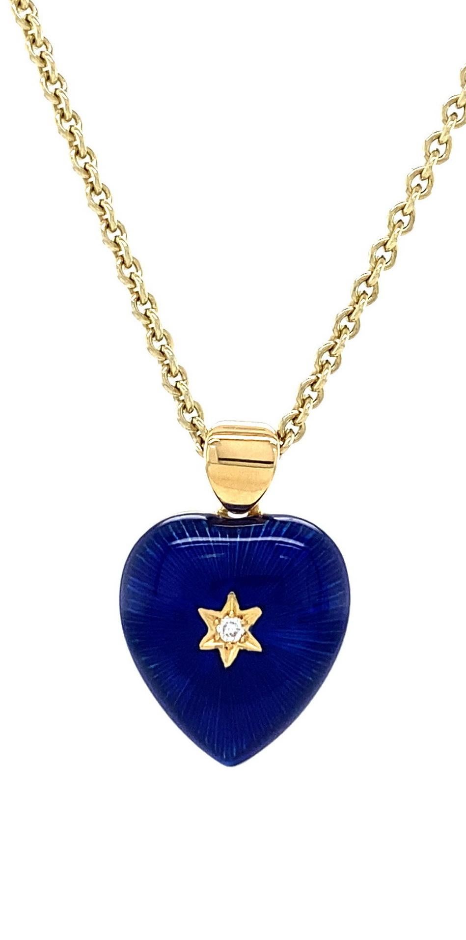 Victor Mayer heart shaped two colored pendant necklace 18k yellow gold, dark blue, yellow vitreous enamel, 2 diamonds, total 2.02 ct, G VS, measurements app. 11.8 mm x 13.0 mm

About the creator Victor Mayer
Victor Mayer is internationally renowned