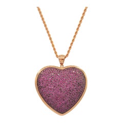 Heart Shaped Pendant in Rubies Pave and 18 Karat Pink Gold
