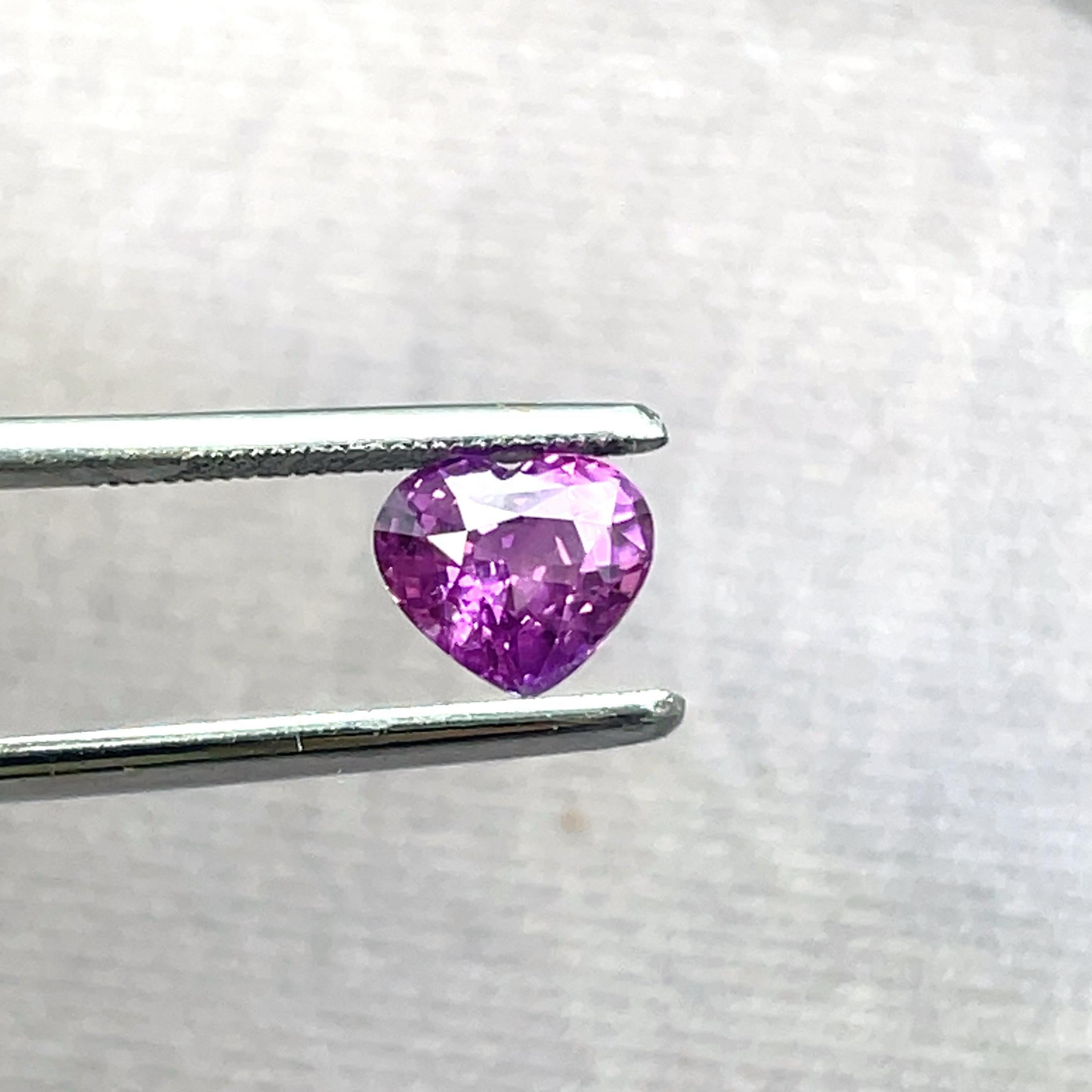 Fall head over heels for this 1.74 Cts heart-shaped pink sapphire, which has been skillfully fashioned into the shape of a heart to symbolize passion and love. 

This gemstone reflects the soft colors of romance and offers a heartfelt sign of