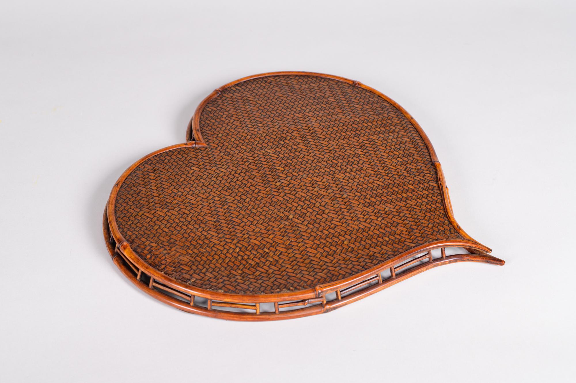 Heart shaped rattan and bamboo tray. Meiji period (1868-1912) woven tray in a highly unusual shape for a tray. Beautiful patina.