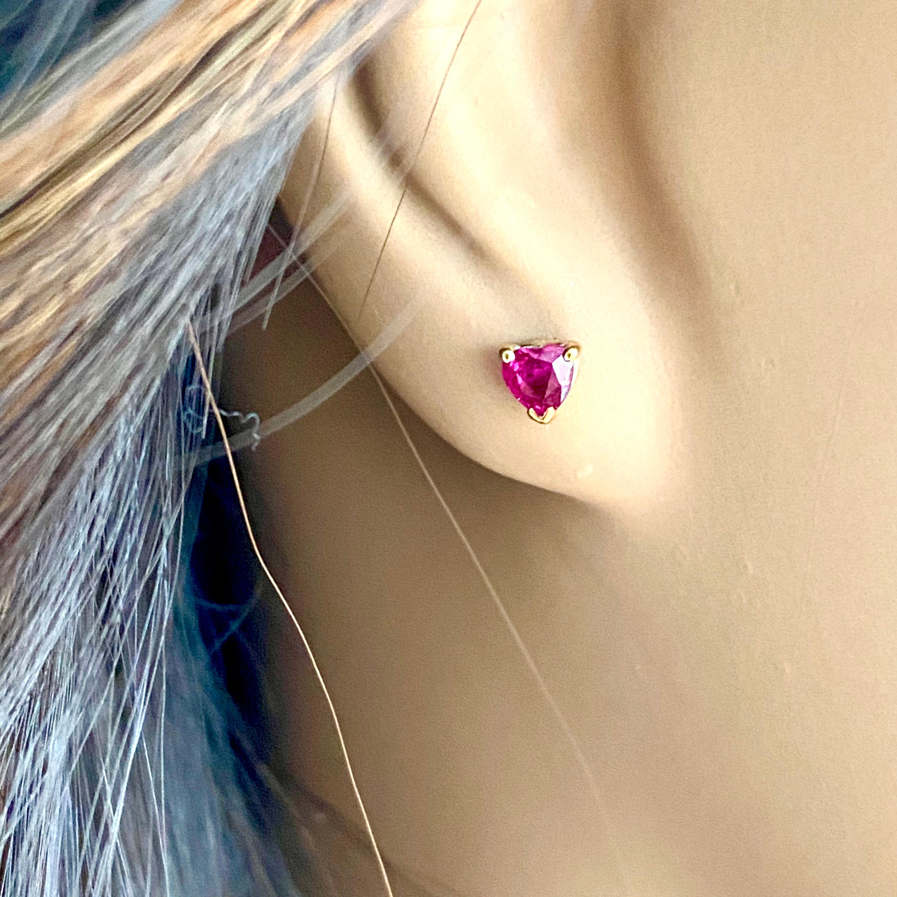 Contemporary Heart Shaped Rubies Set in Yellow Gold Stud Earrings