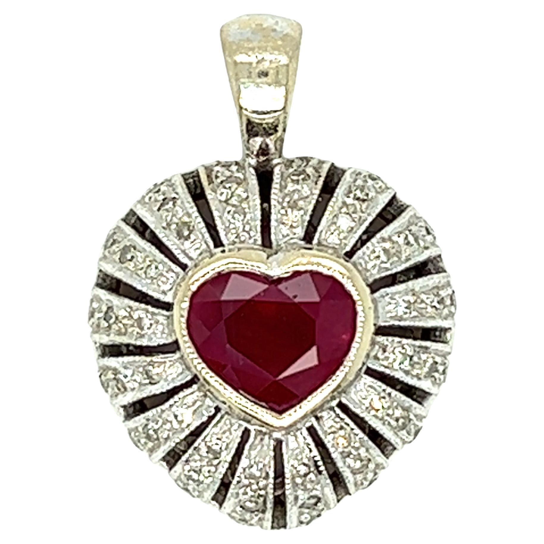 This beautiful vintage pendant showcases a 1.35 carat (approx.) heart shaped ruby at center. The ruby is surrounded by 64 round brilliant cut diamond weighing approximately 0.70 carat. The dome shape of the pendant adds dimension to the piece. It is